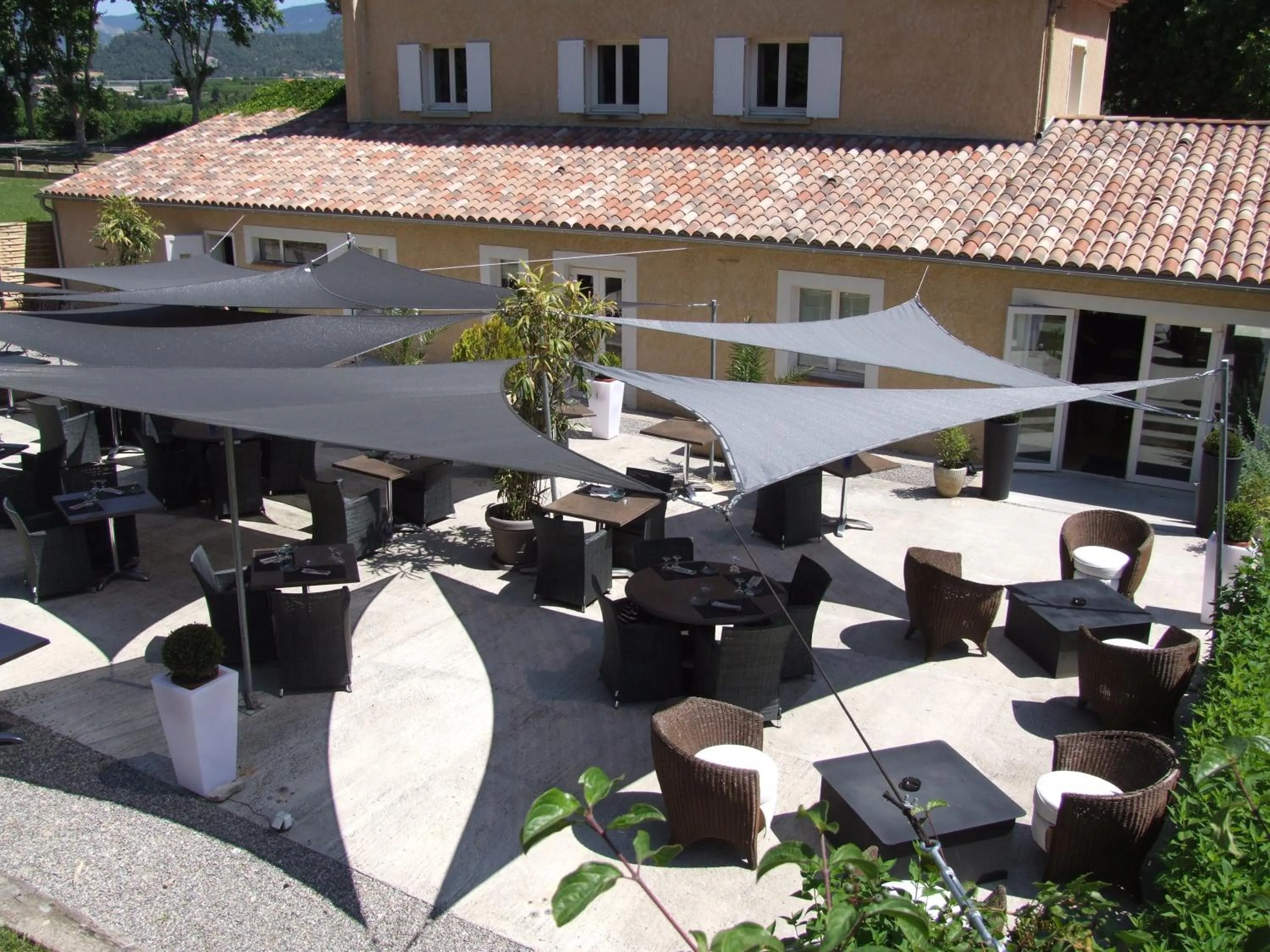 Balcony/Terrace in Logis Hôtel La Magnanerie - Côté Bistro
