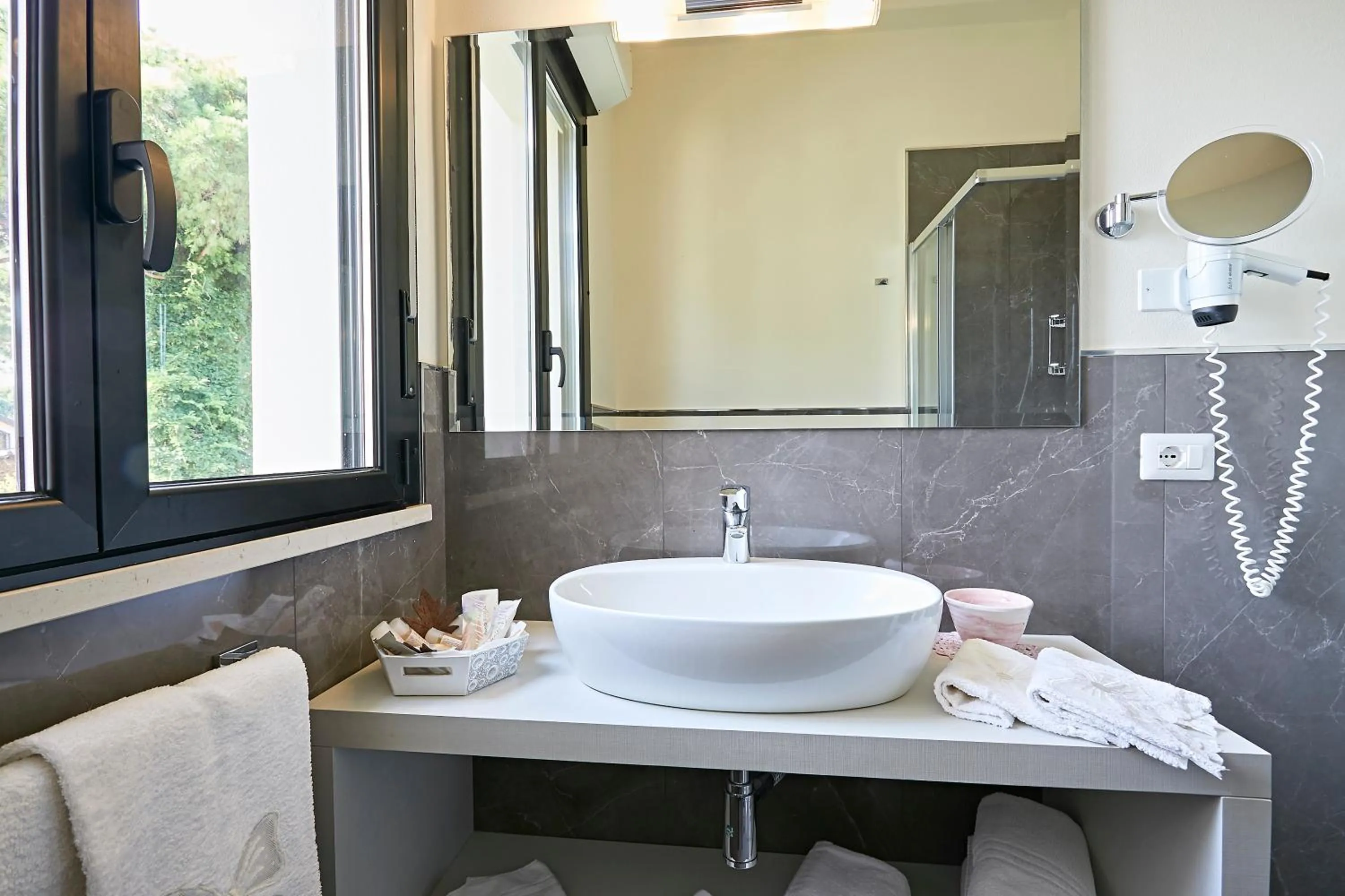 Bathroom in Hotel Athena