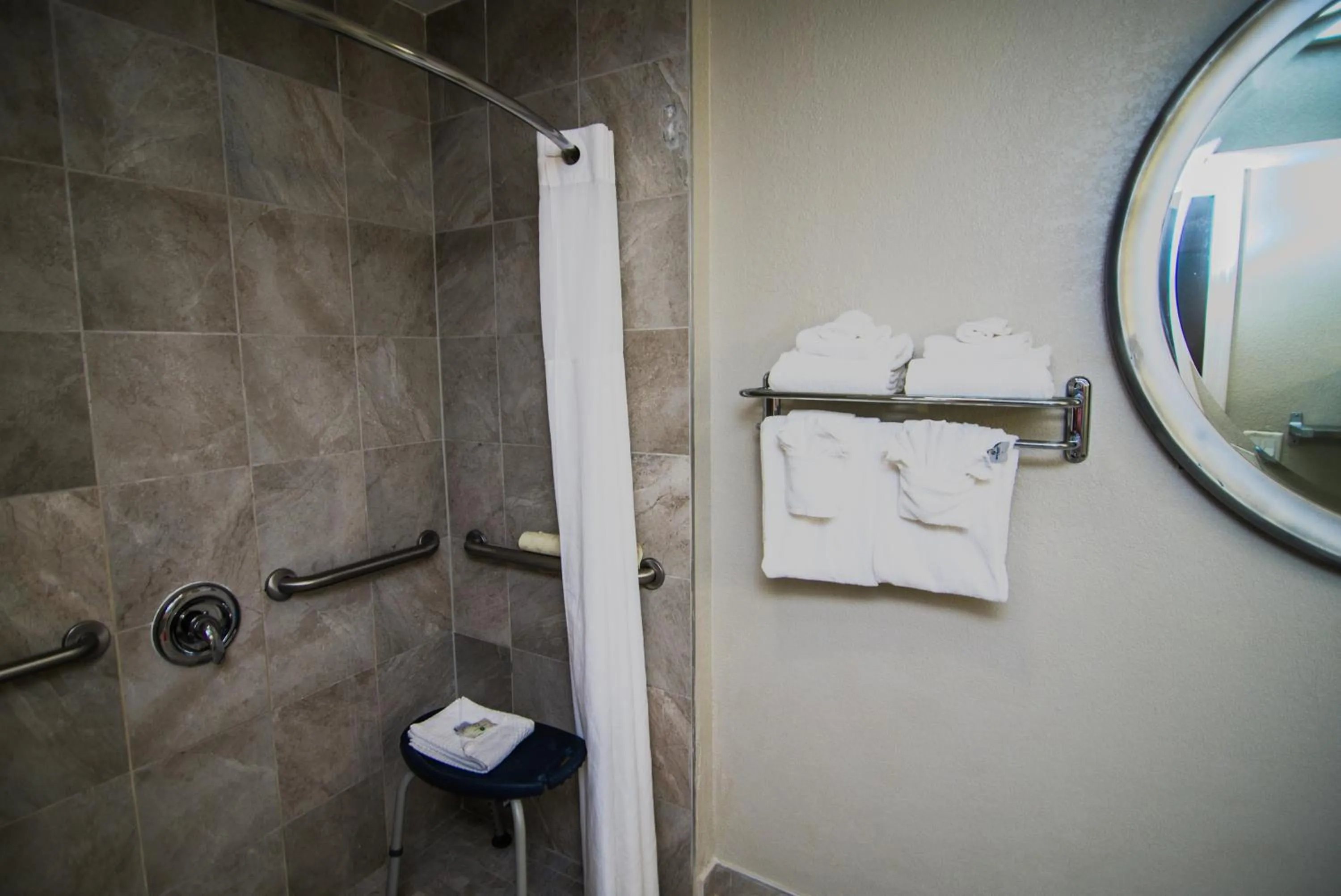 Shower in Quality Inn & Suites By the Parks