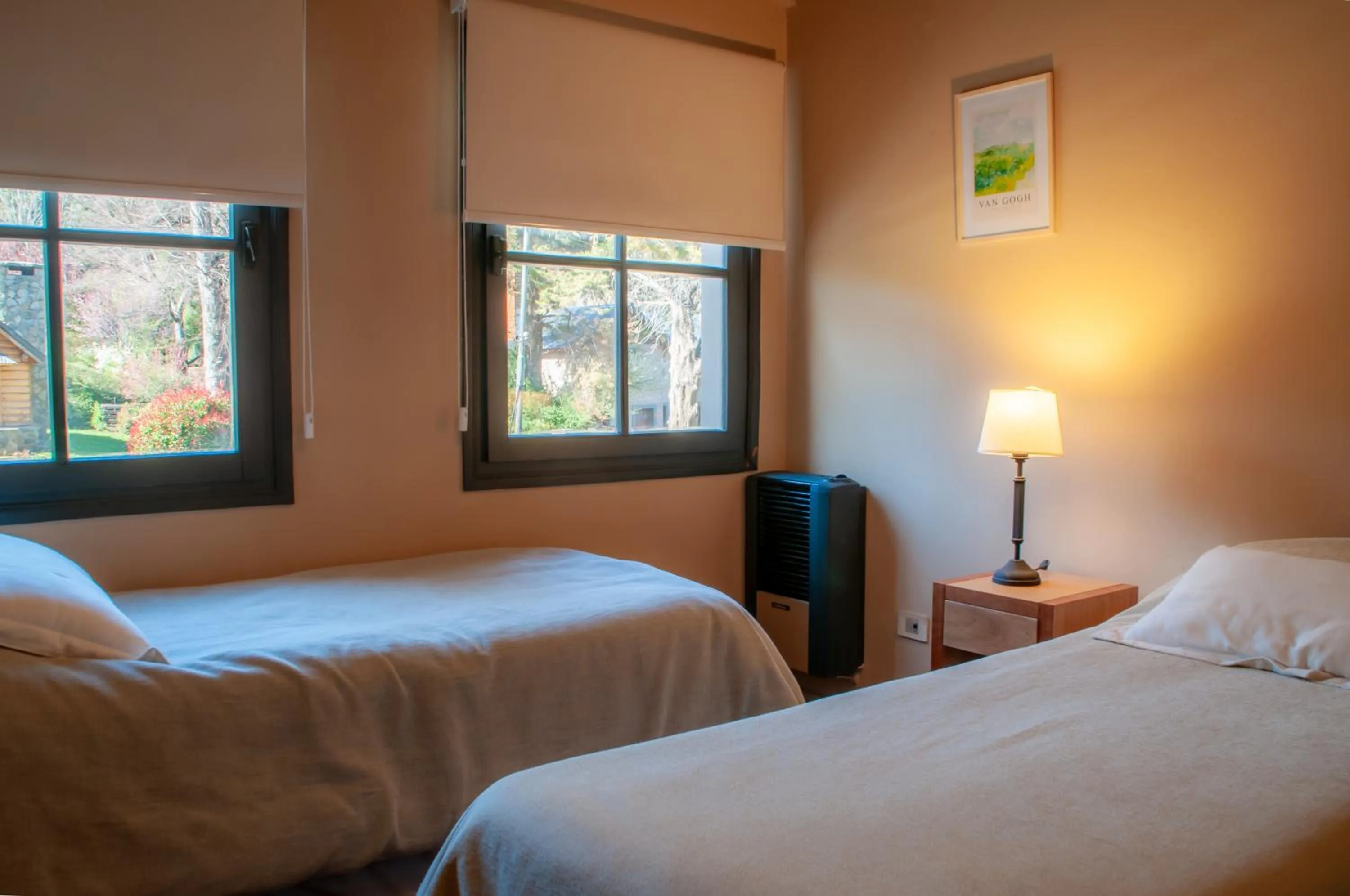 Bed in Las Cumbres Apart & Suites