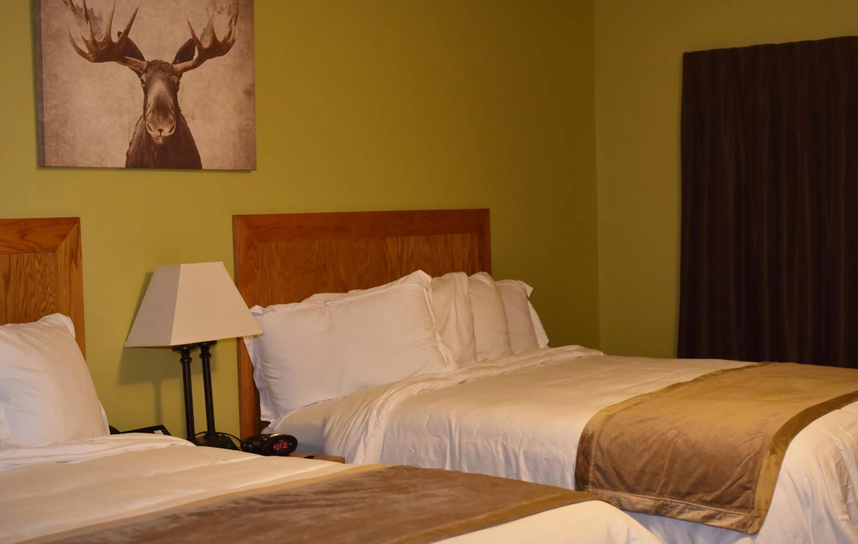 Bed in Champions Black Bear Lodge