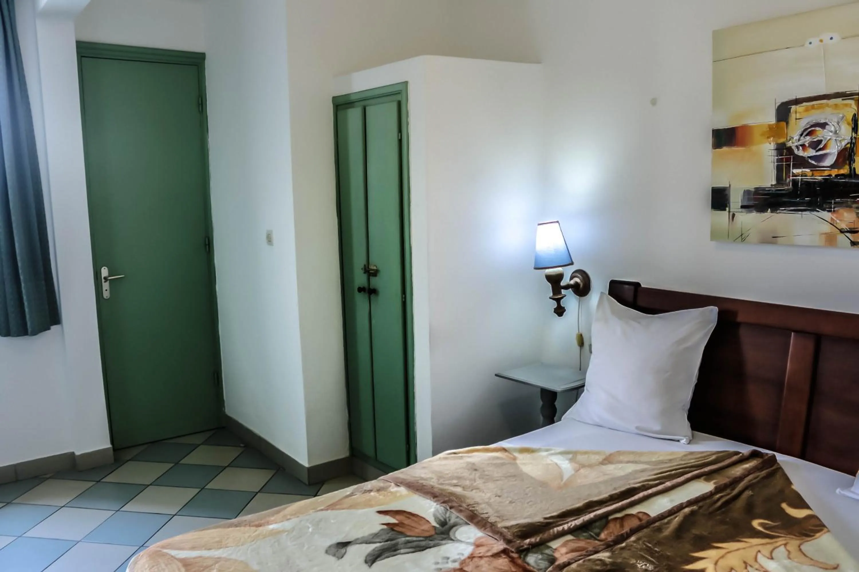 Bed in Tchero Appartement 1