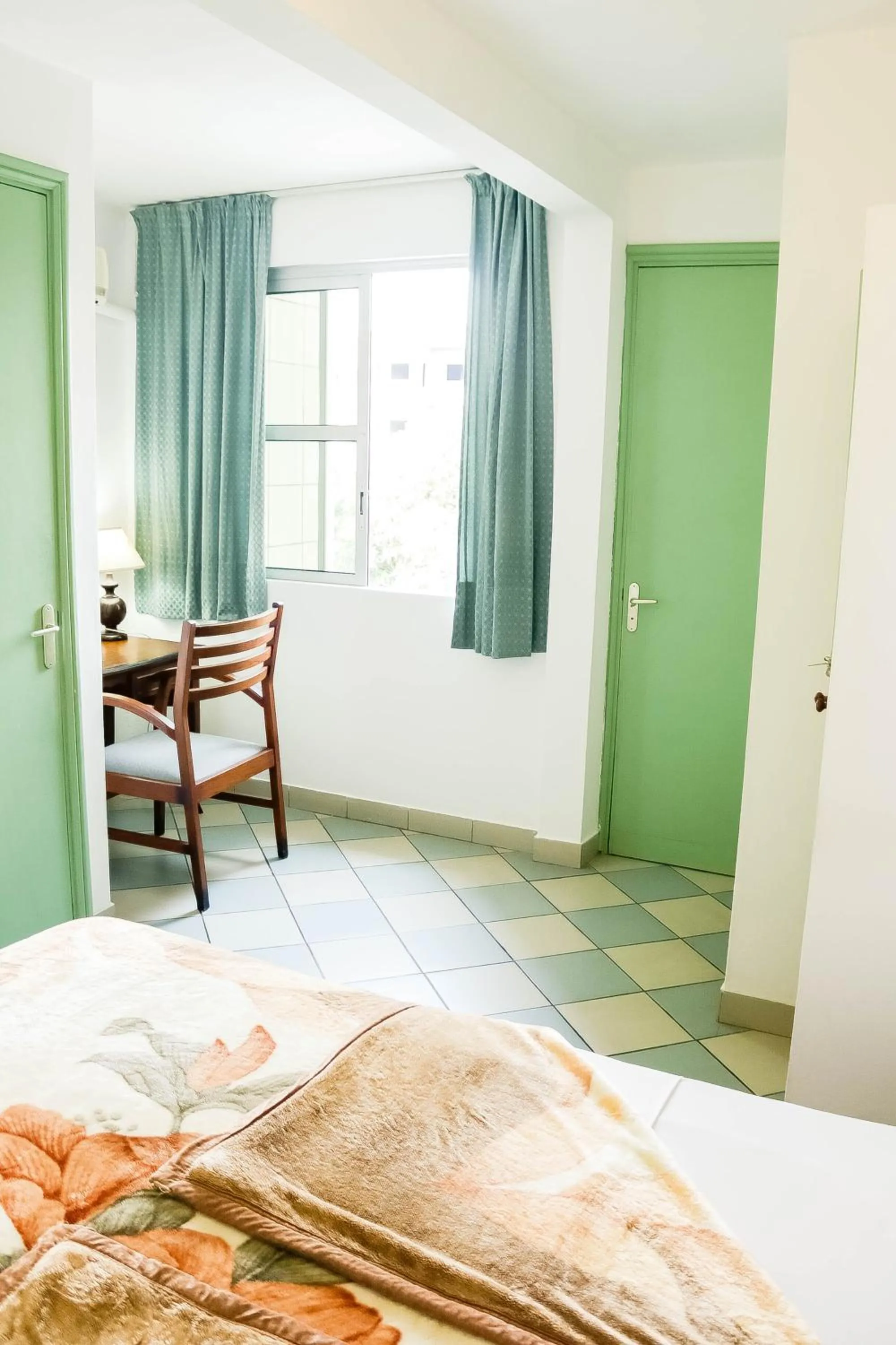 Bed in Tchero Appartement 1