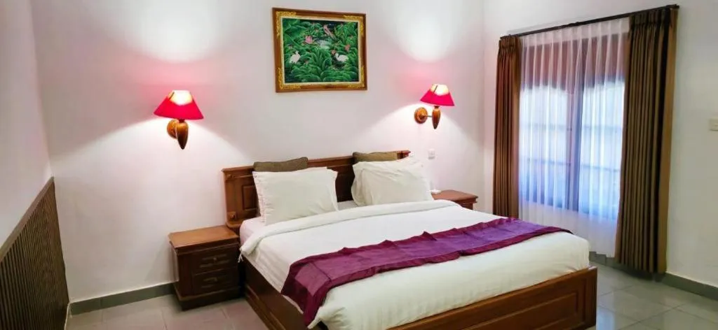 Bed in Stana Puri Gopa Hotel