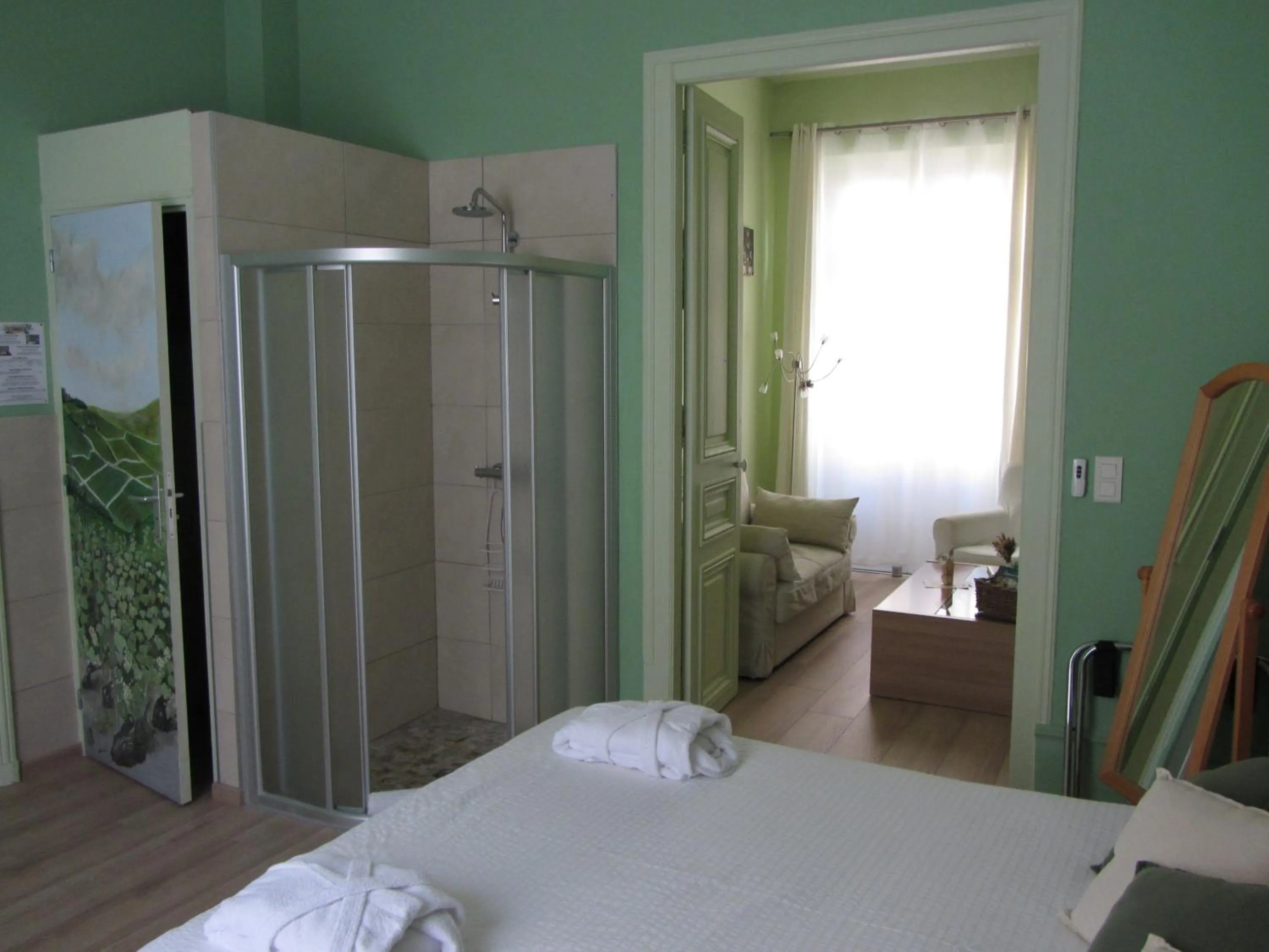 Bed in Chambre D'hôtes Les Epicuriens