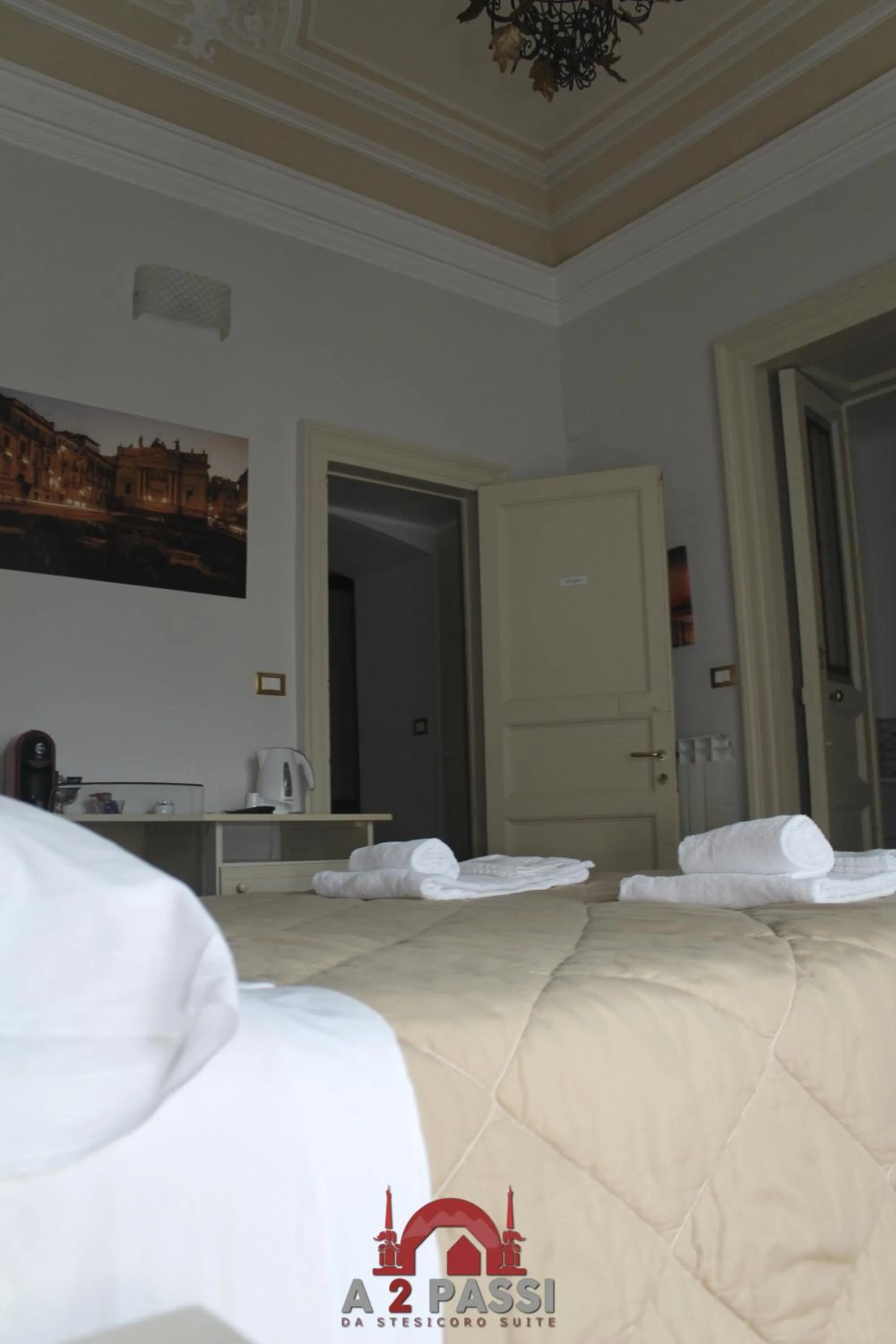 Photo of the whole room, Bed in A 2 Passi da Stesicoro Suite Catania