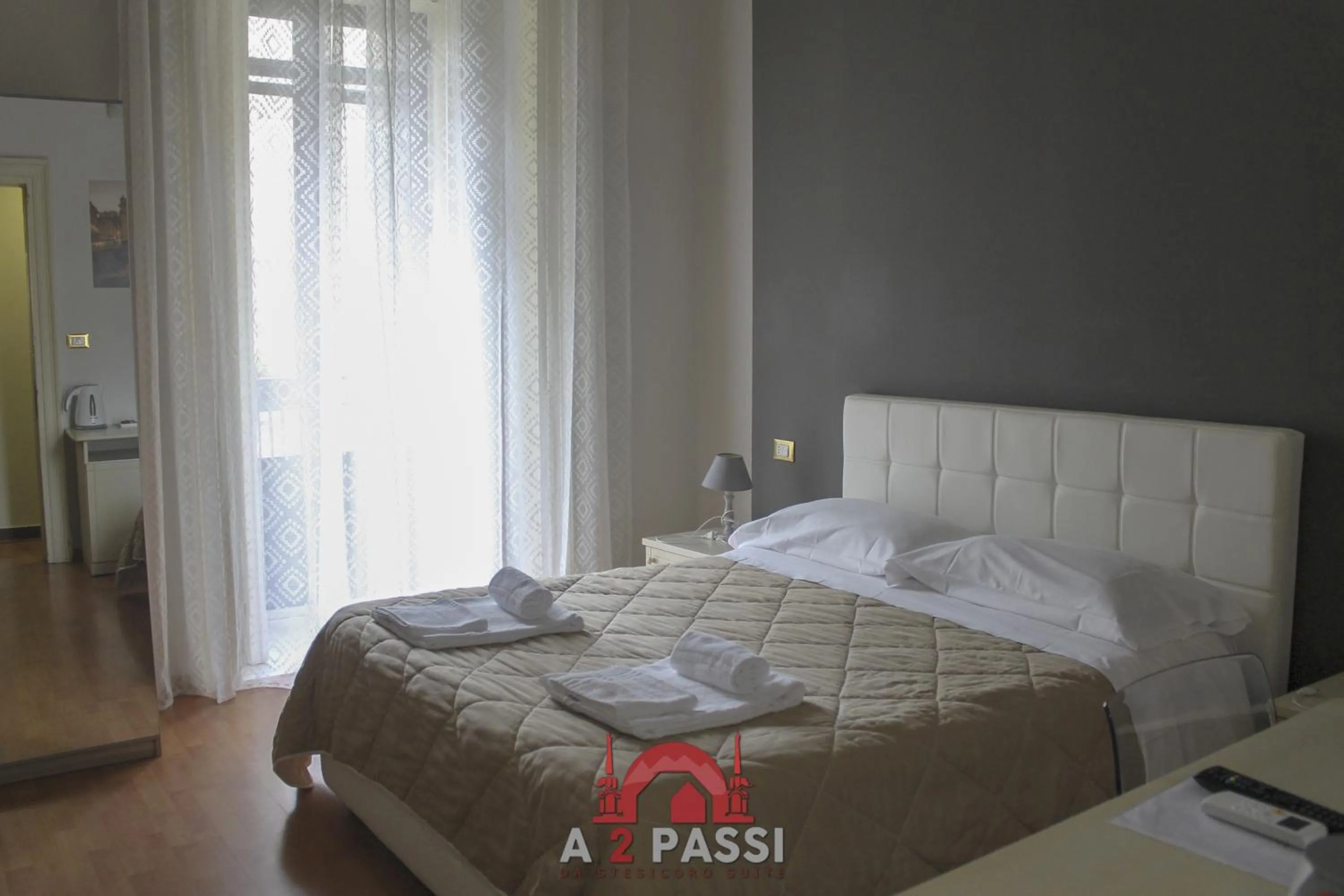 Photo of the whole room, Bed in A 2 Passi da Stesicoro Suite Catania