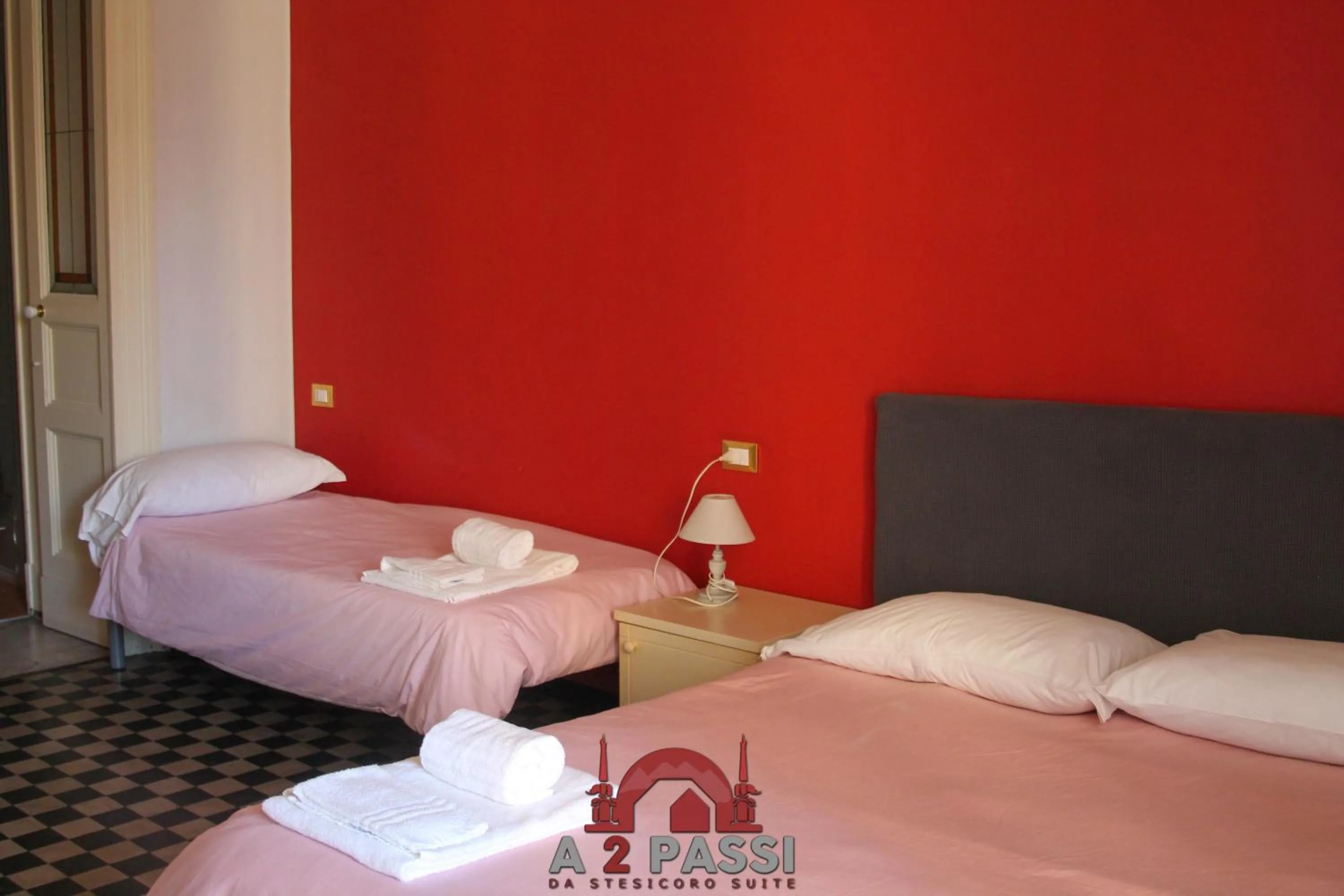 Bed in A 2 Passi da Stesicoro Suite Catania