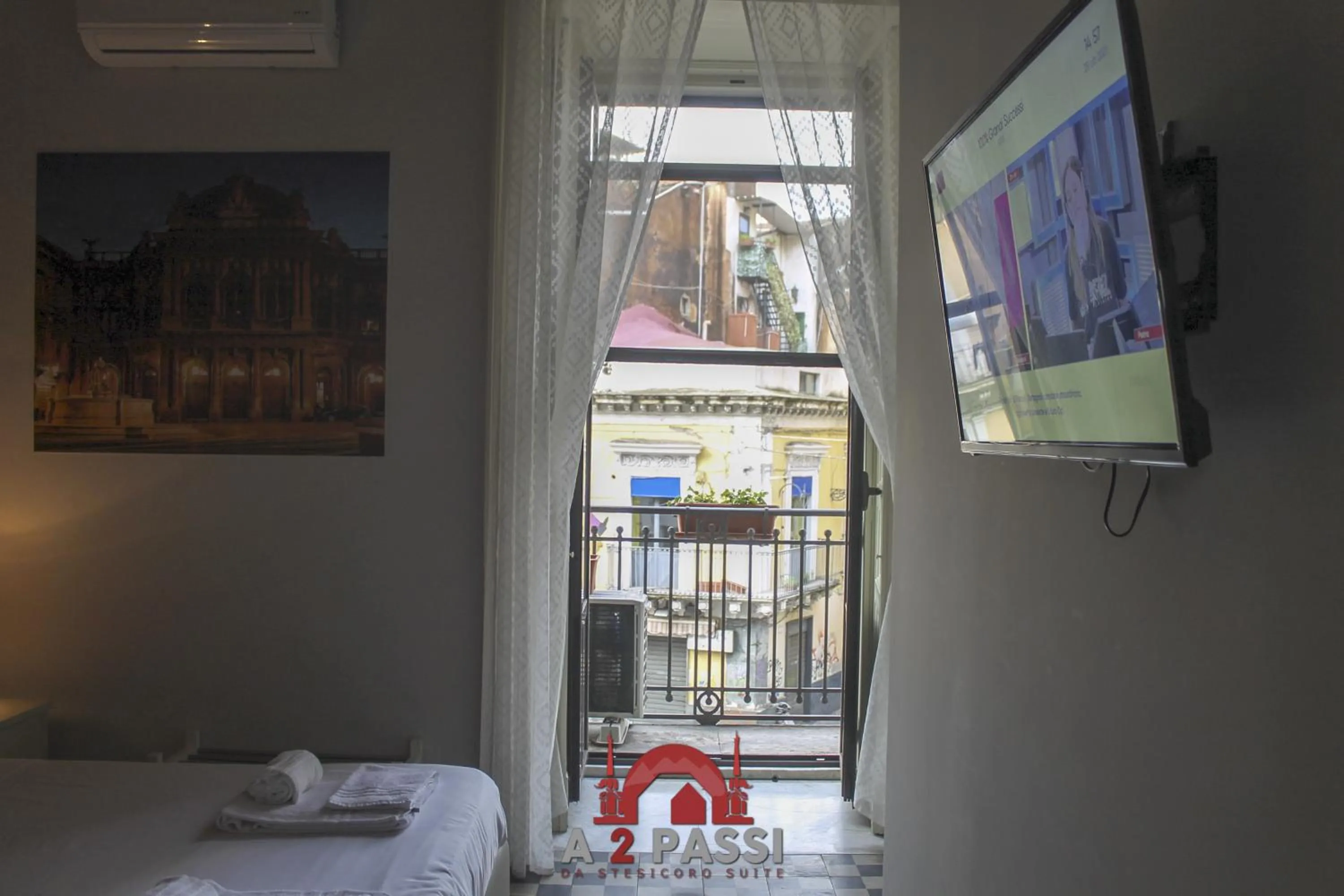 Photo of the whole room, Bed in A 2 Passi da Stesicoro Suite Catania