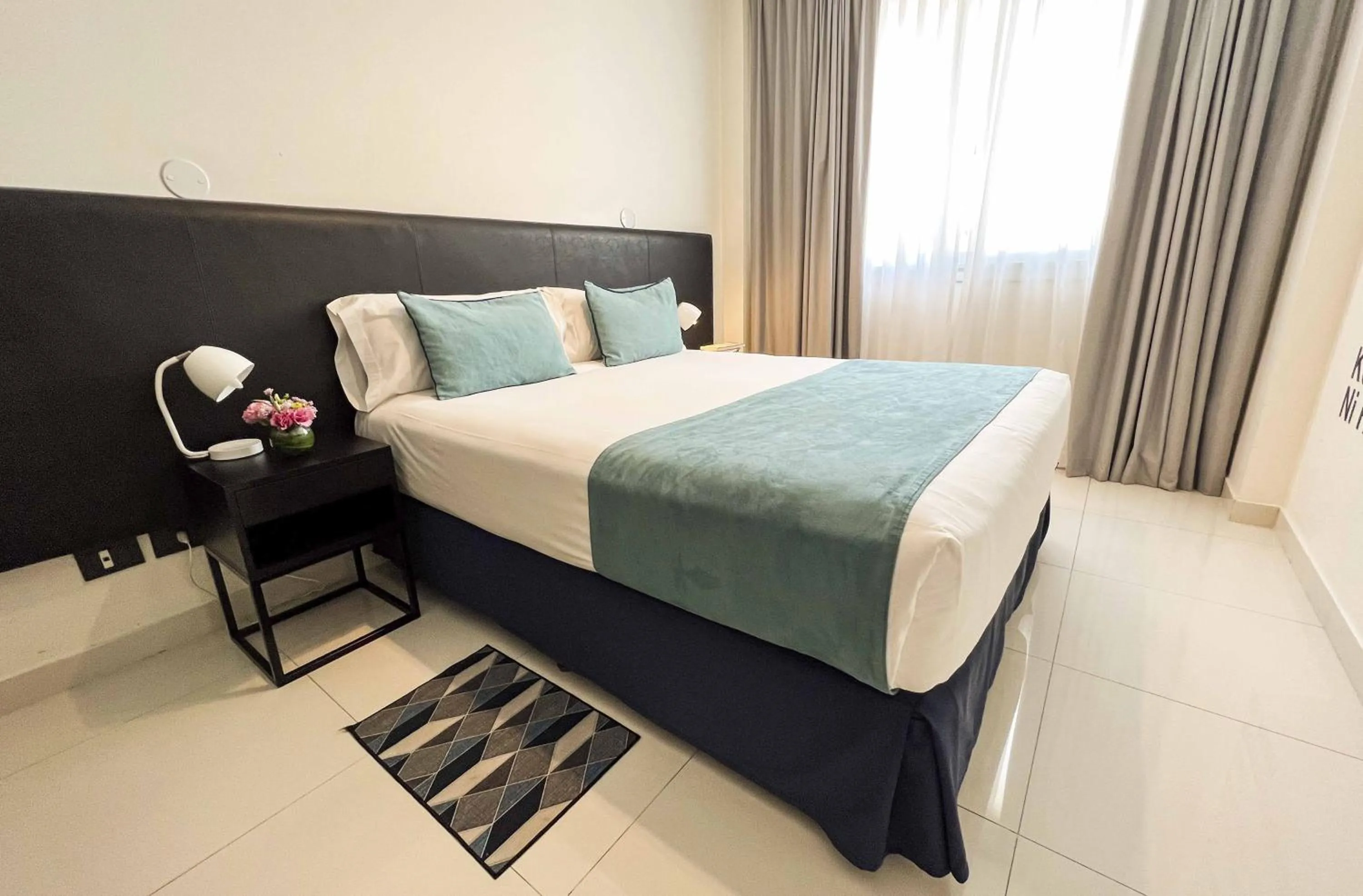 Bed in Cyan Recoleta Hotel