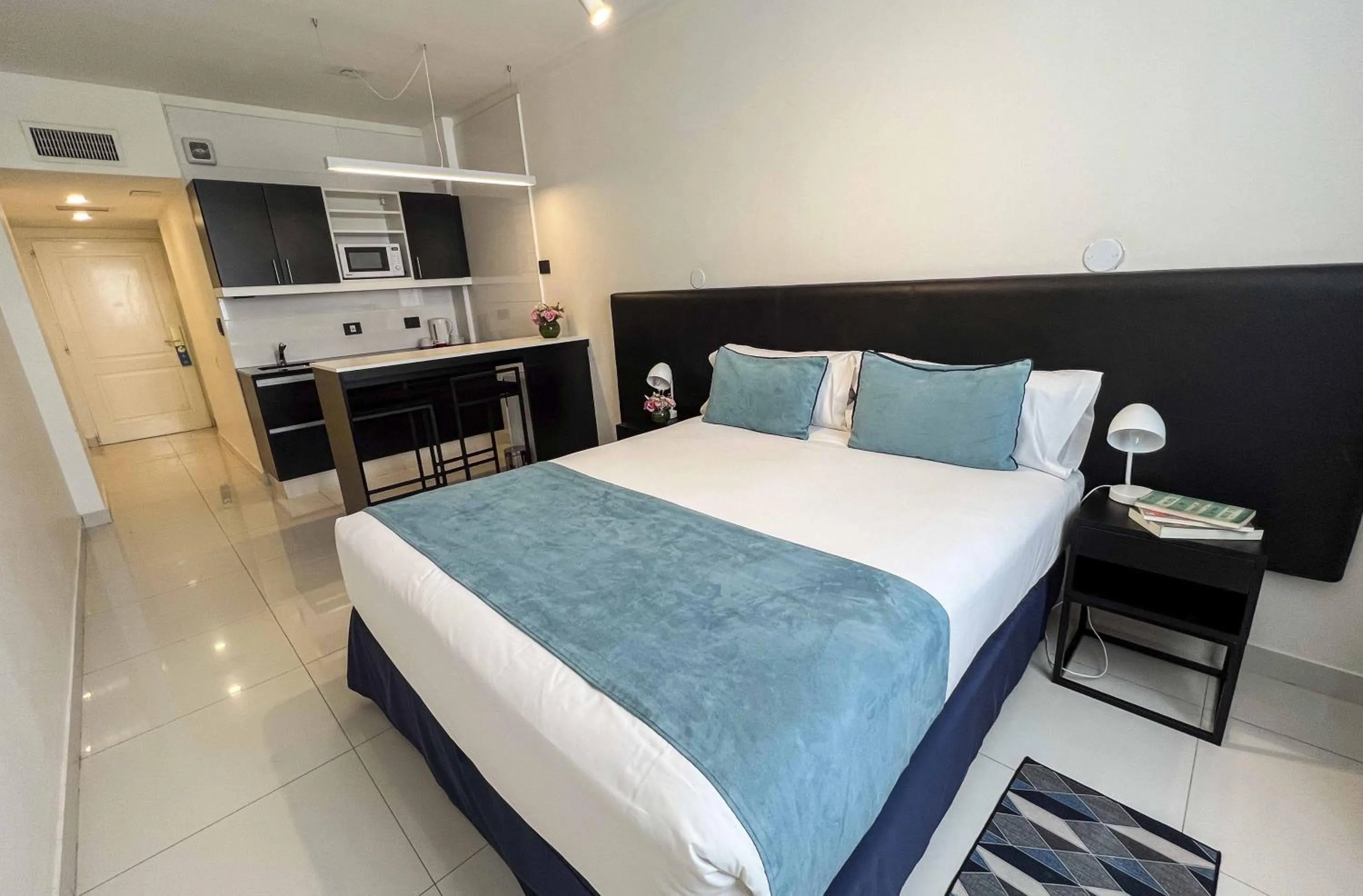 Bed in Cyan Recoleta Hotel