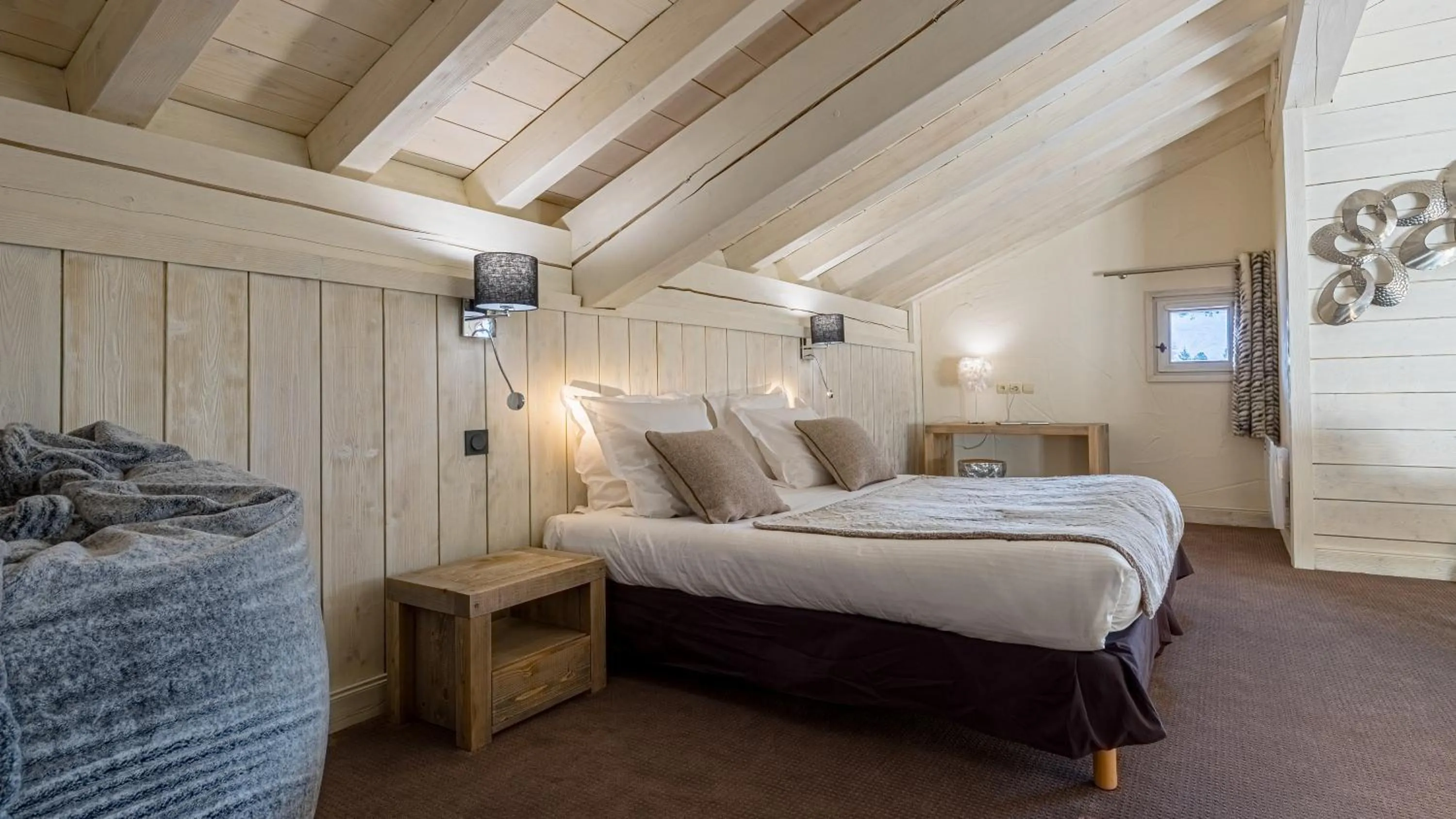 Bed in Hôtel Carlina by Les Etincelles