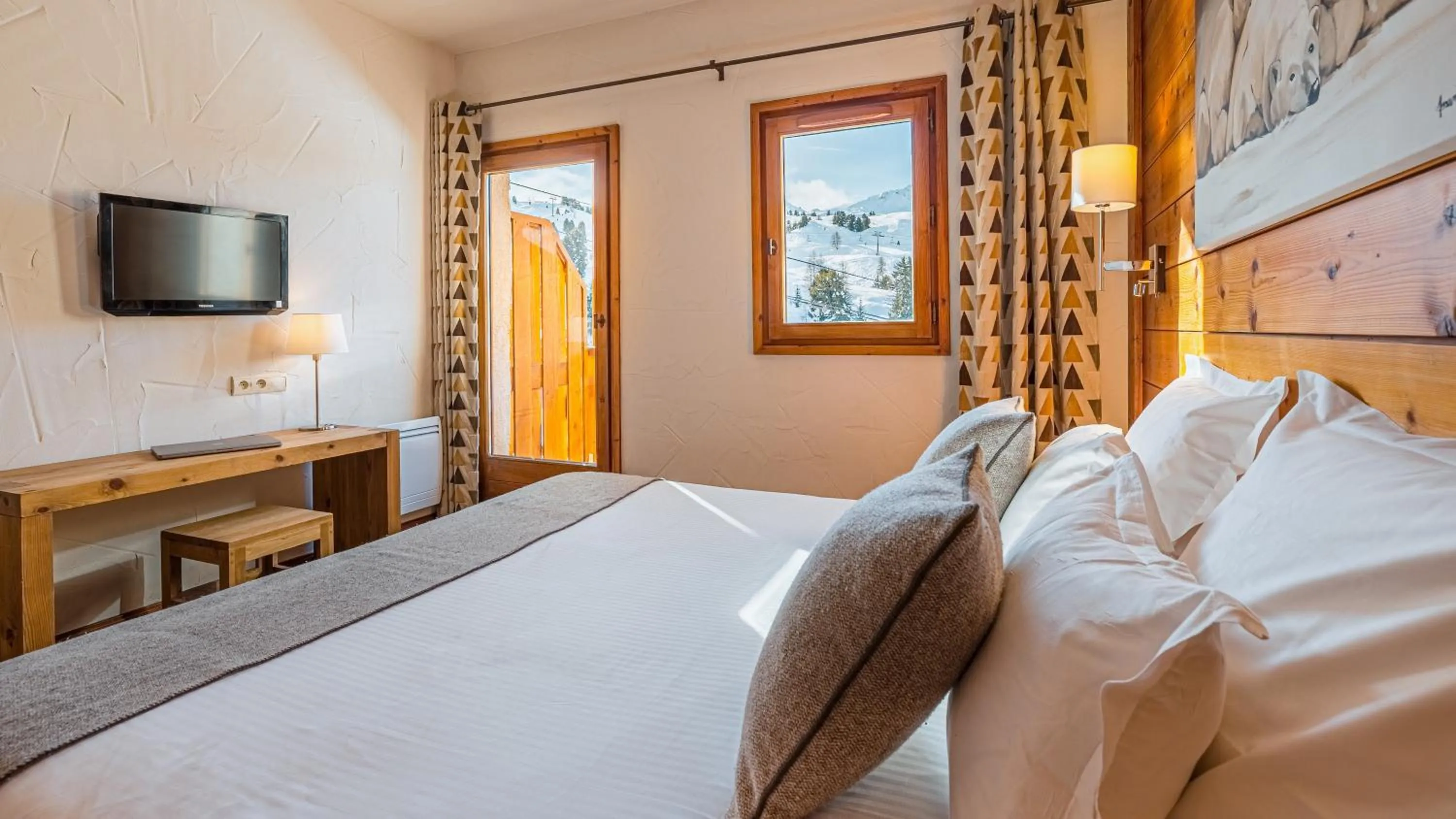 Bed in Hôtel Carlina by Les Etincelles