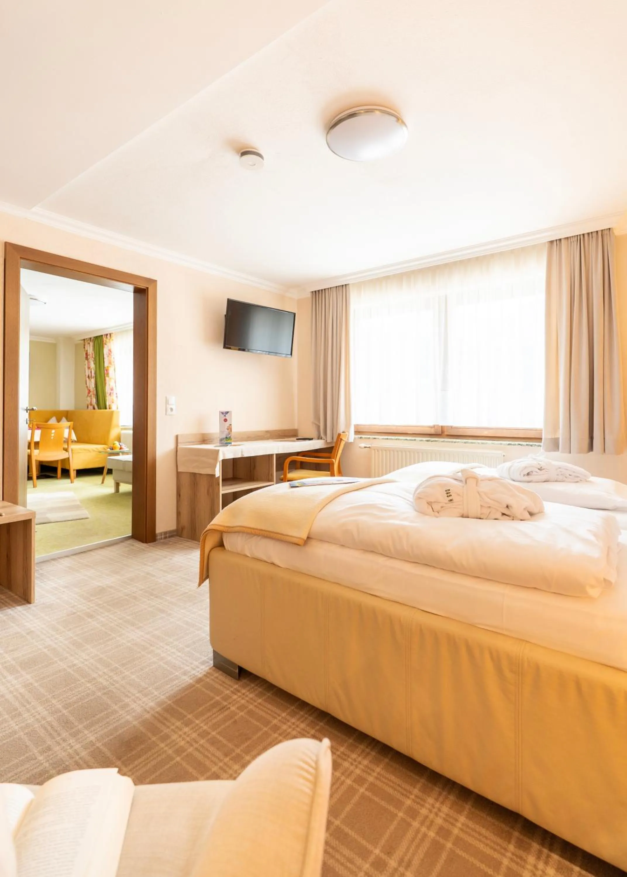 Bed in Chalet Ferienhaus Hubertus