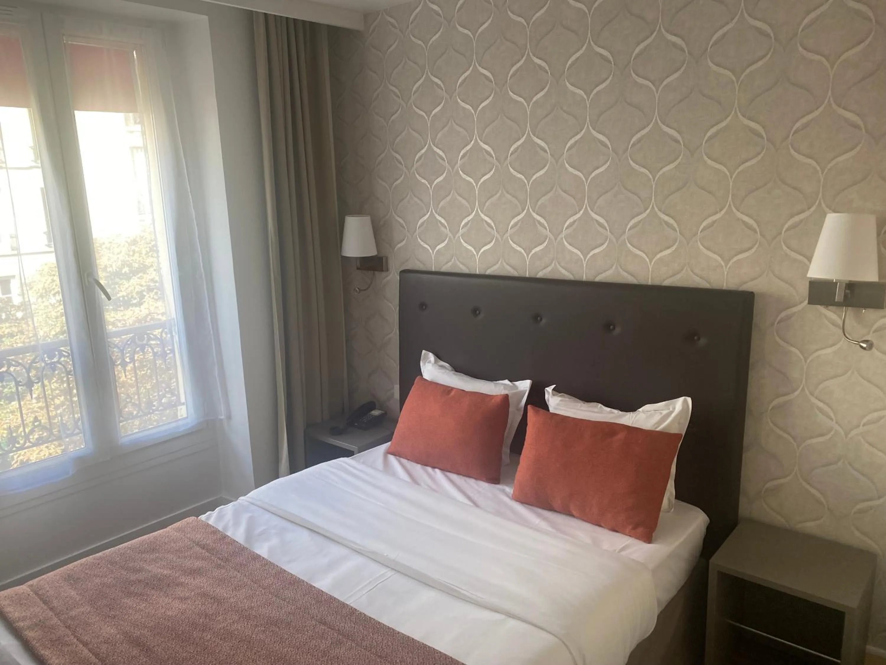 Bed in Hôtel De Venise