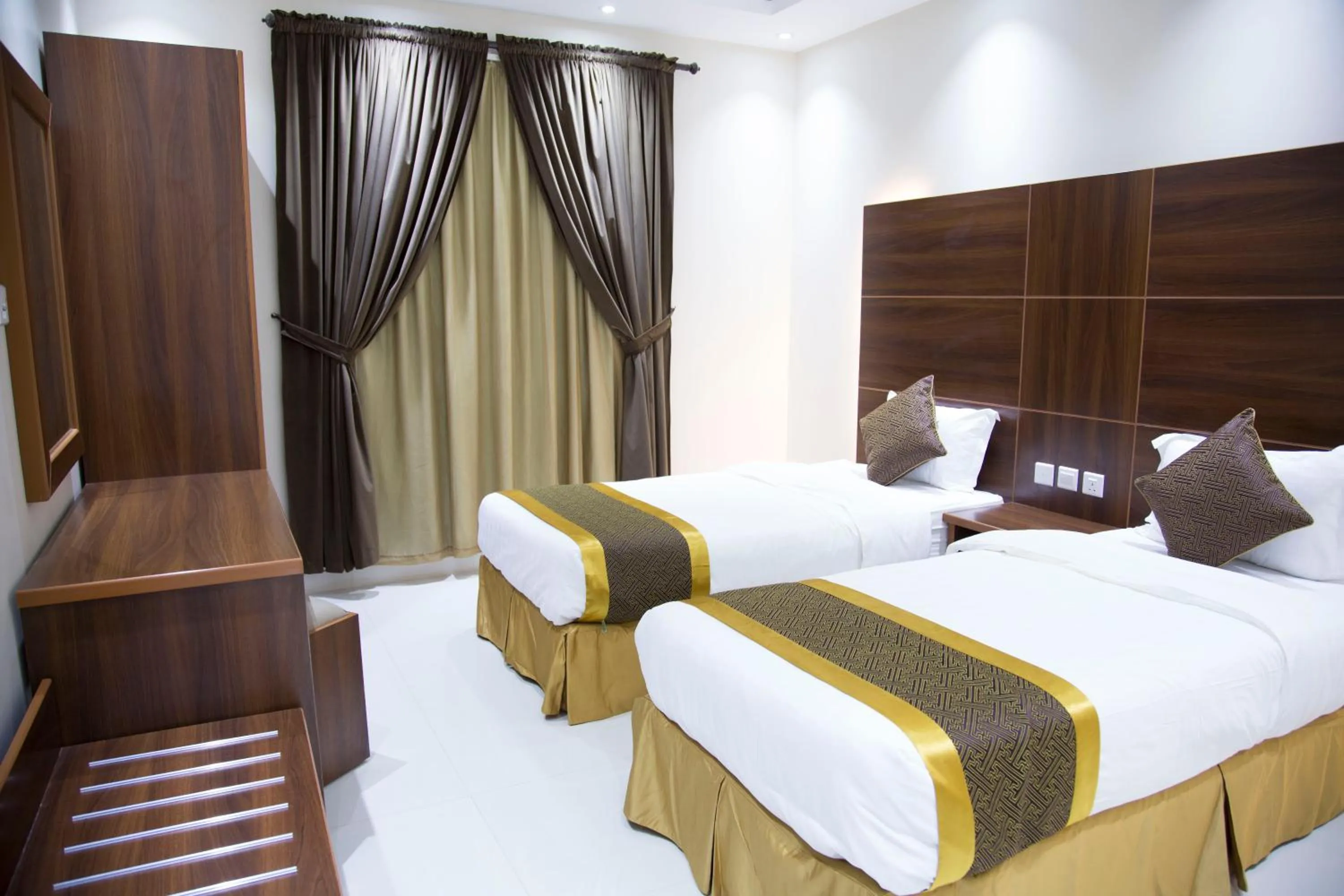 Bed in Alharir Hotel Apartments