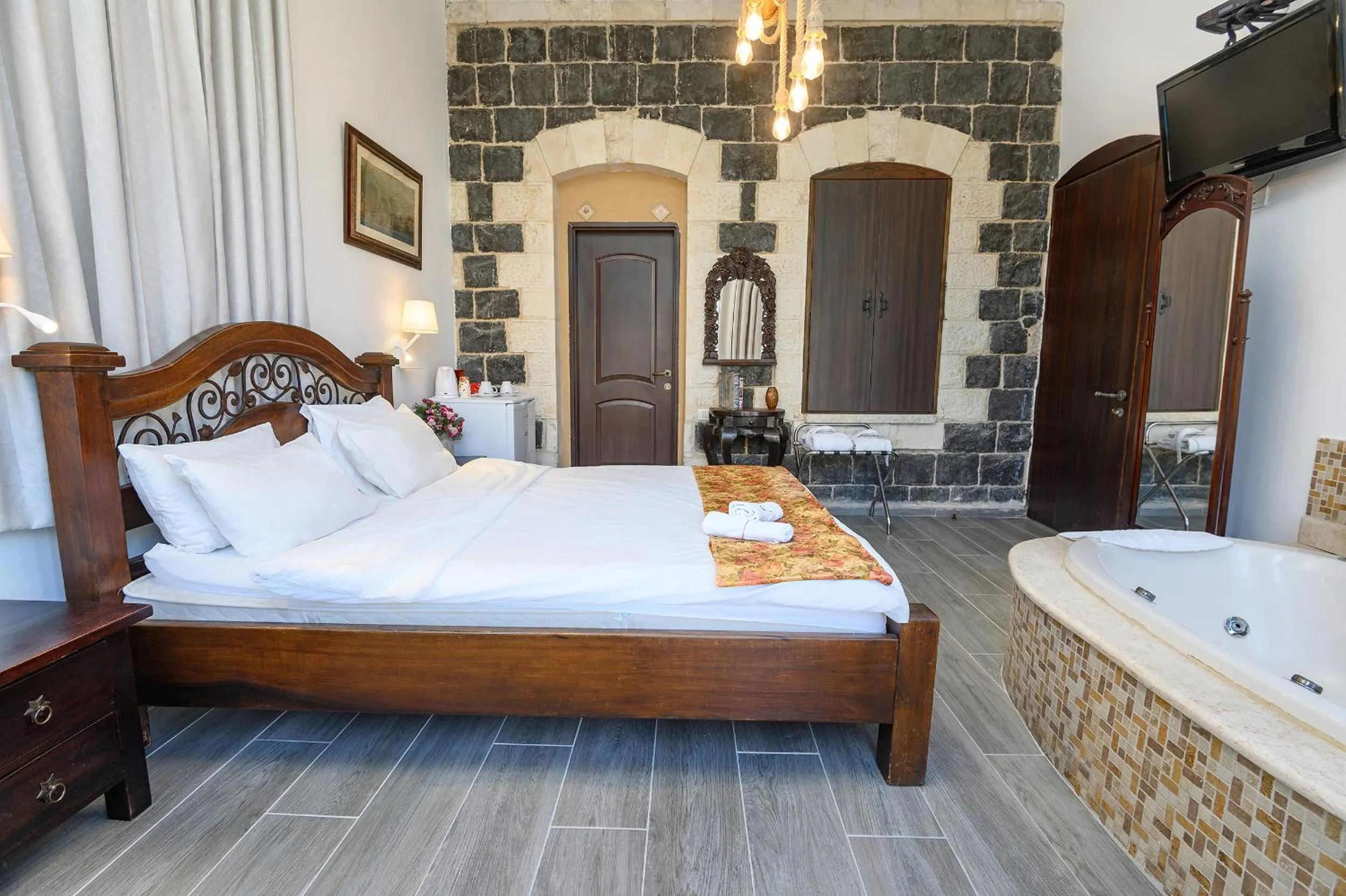 Bed in Shirat Hayam Boutique Hotel