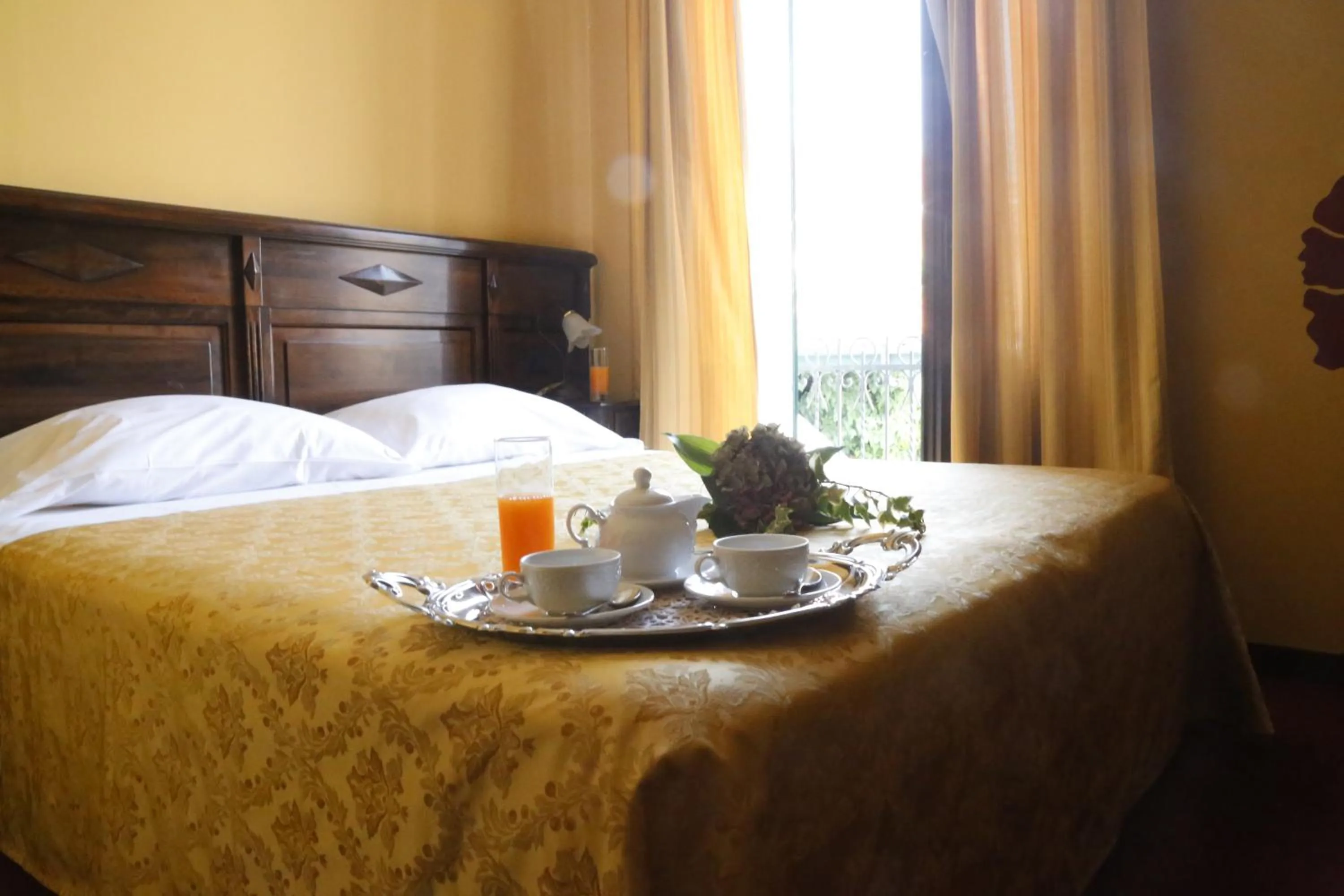 Decorative detail, Bed in Hotel Damian Park Hotel Delle Magnolie