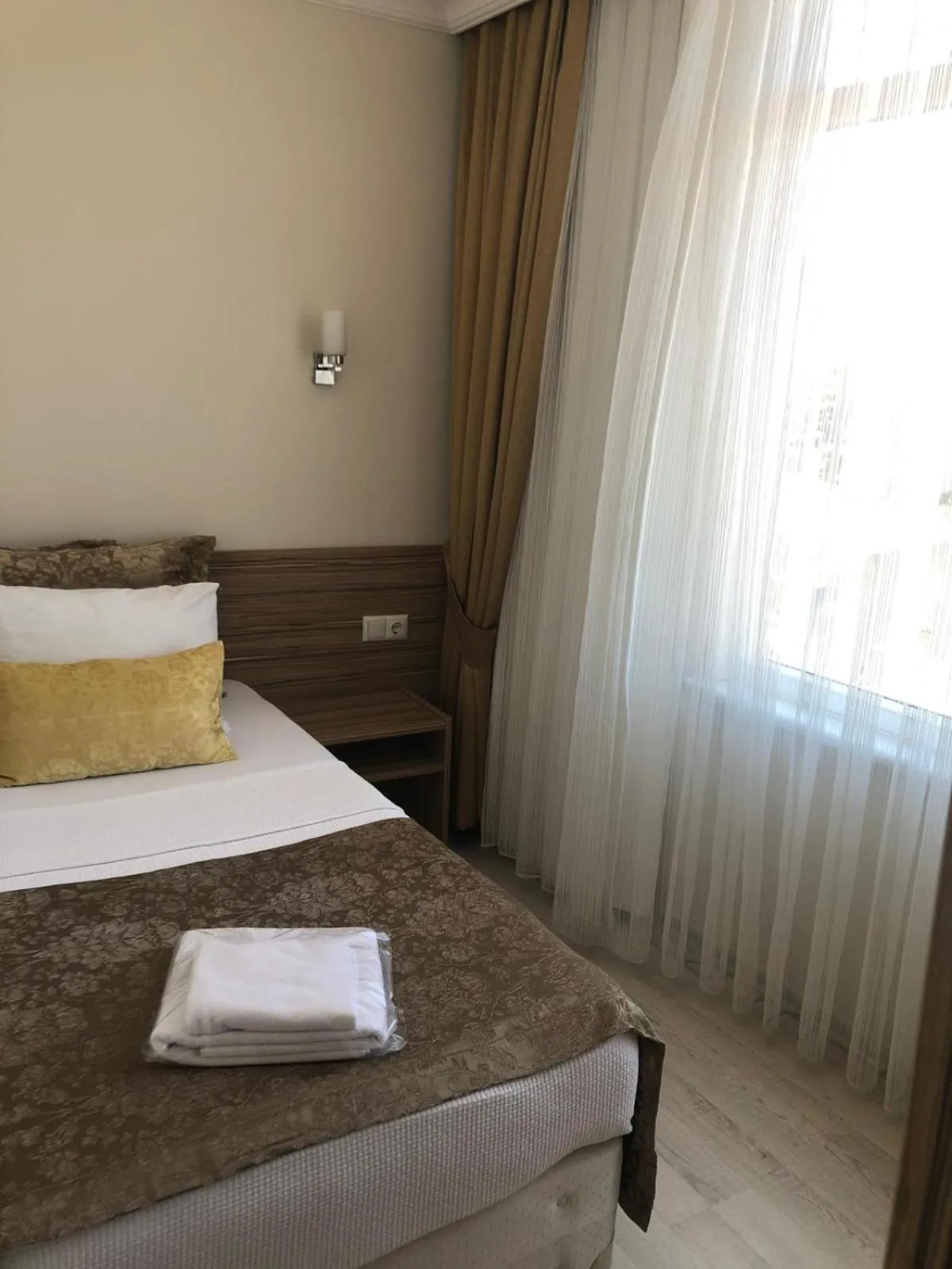 Bed in Sinopark Hotel