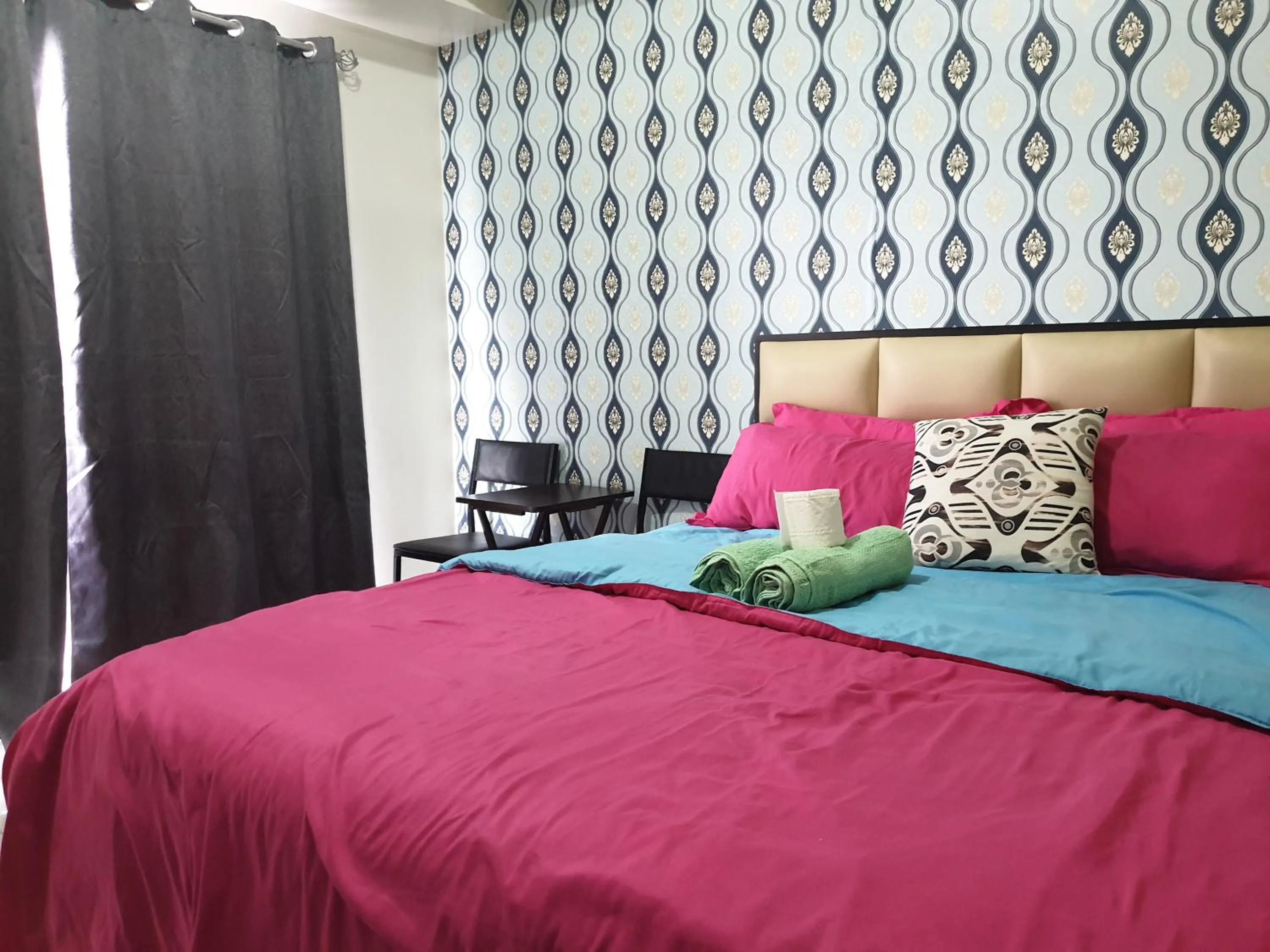 Bed in Wind Residences by Bea and RM