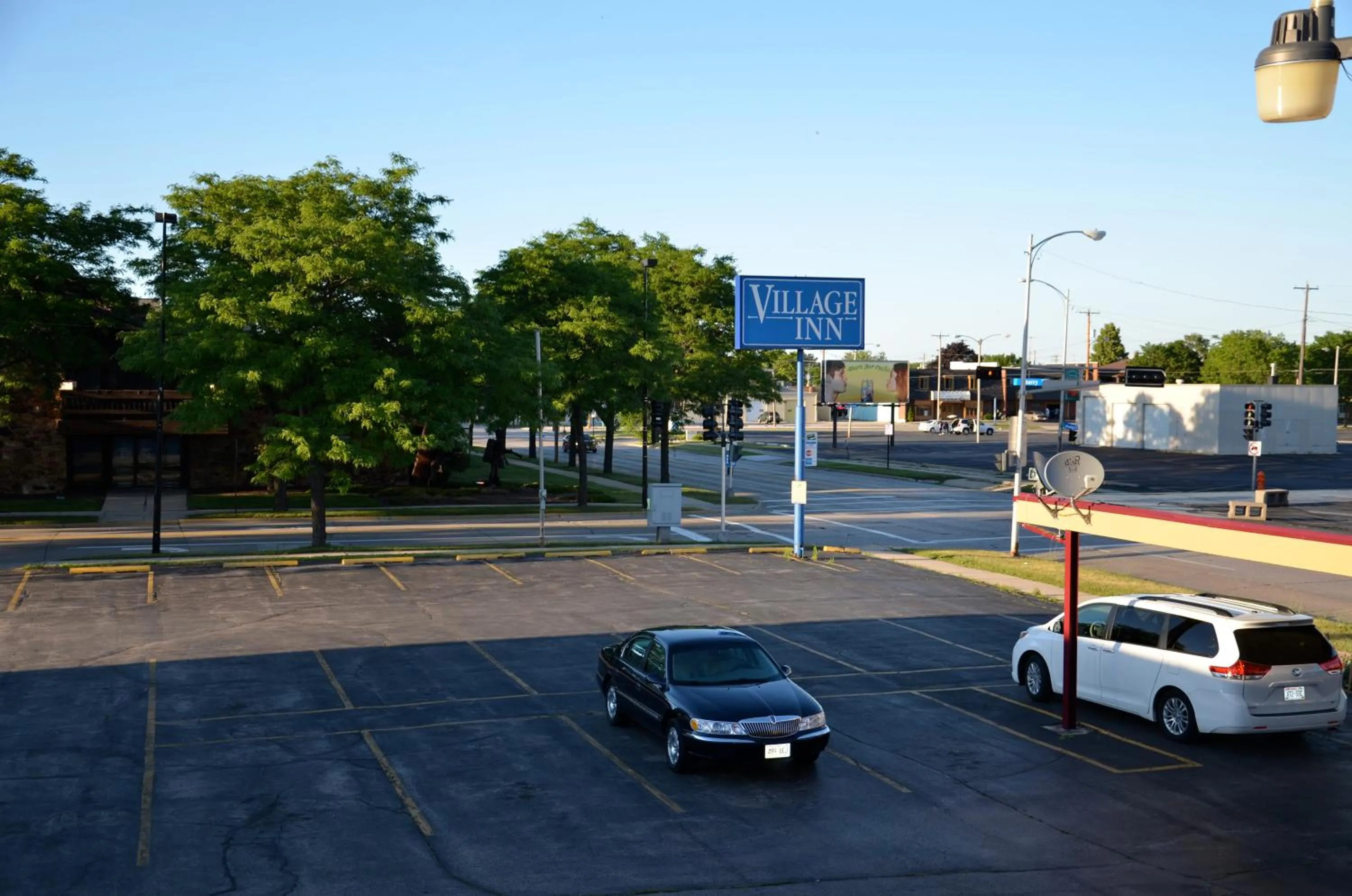 Logo/Certificate/Sign in Village Inn Green Bay