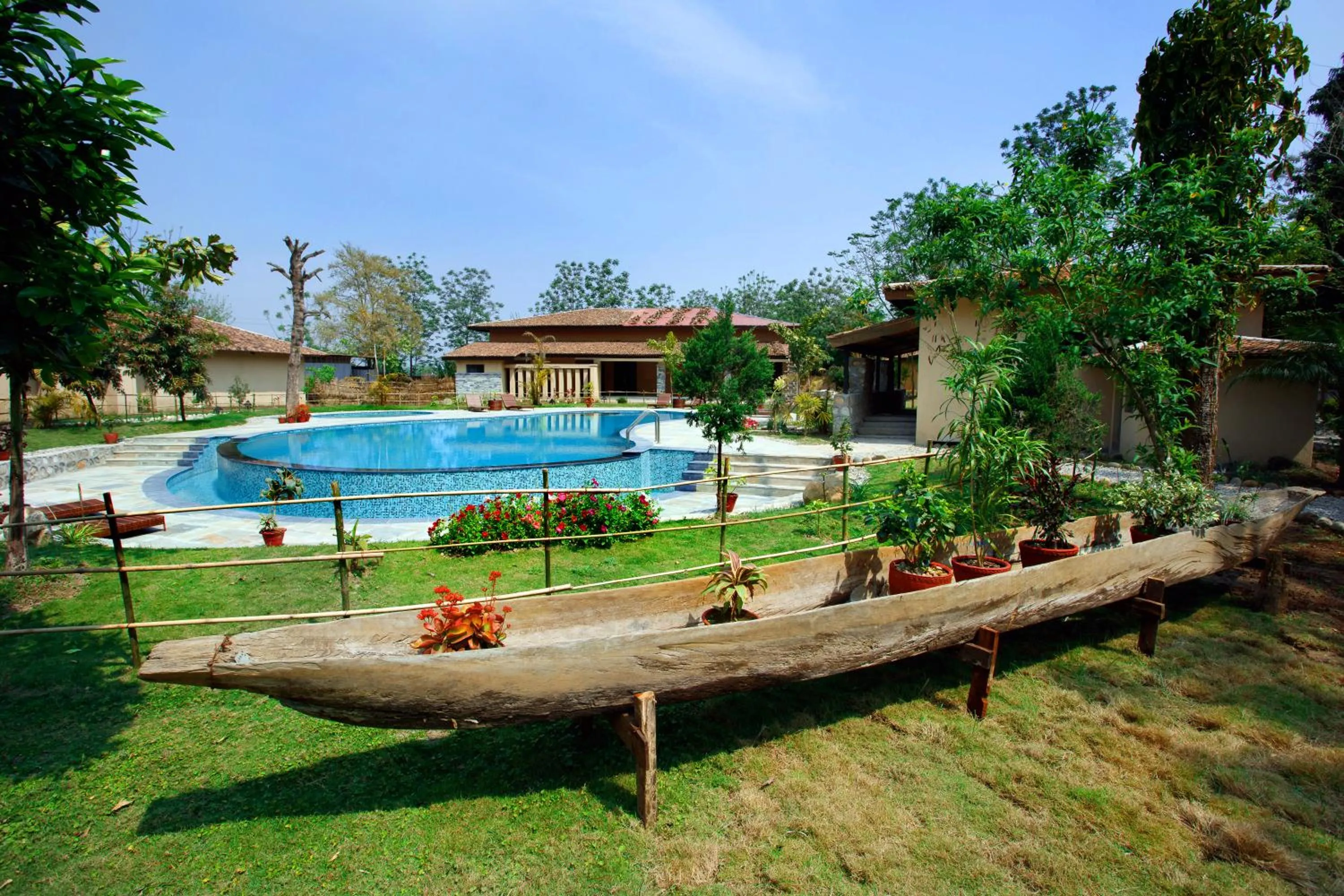 Swimming pool in Jungle Villa Resort - Near Chitwan National Park