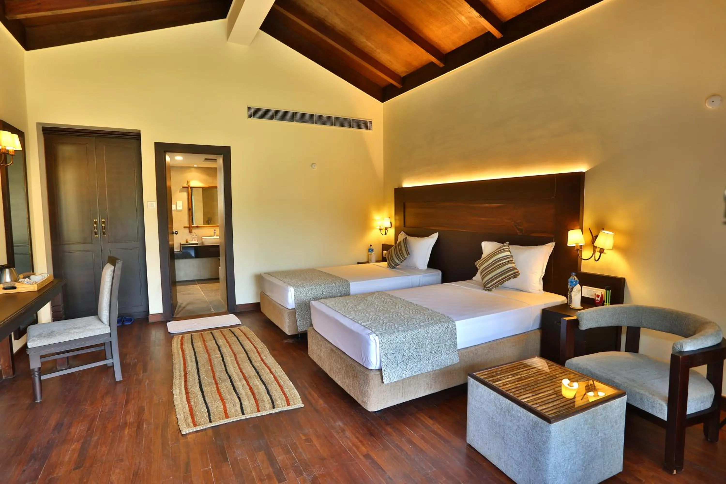 Bedroom, Bed in Jungle Villa Resort - Near Chitwan National Park