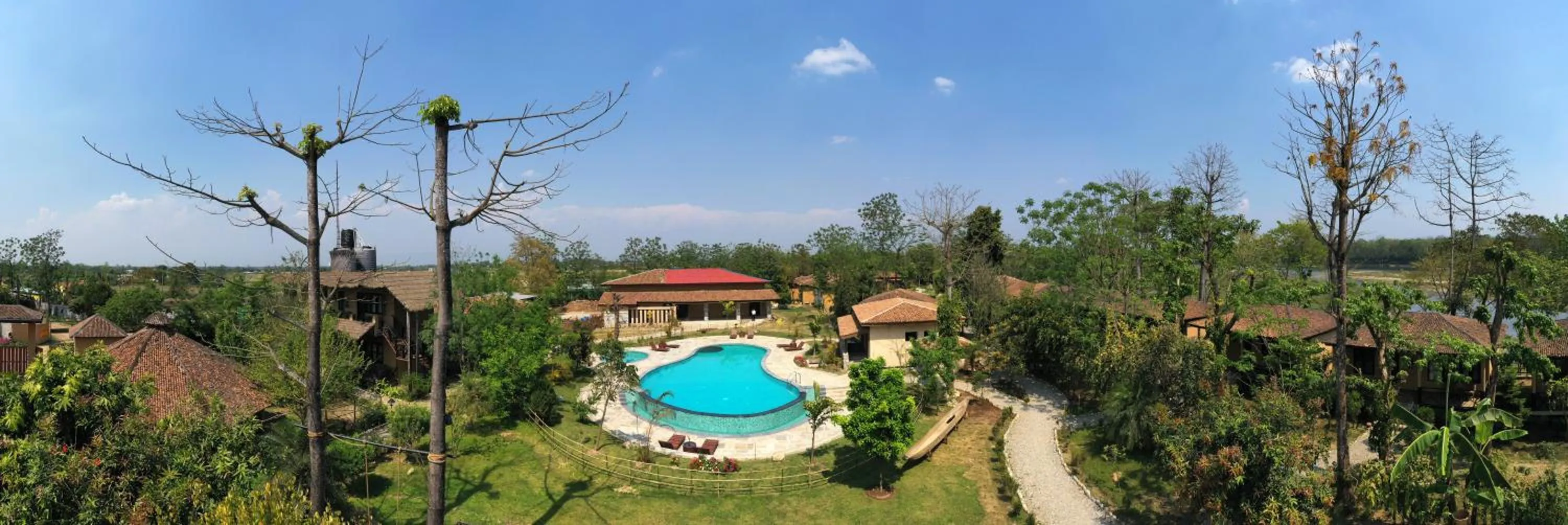 Swimming pool in Jungle Villa Resort - Near Chitwan National Park