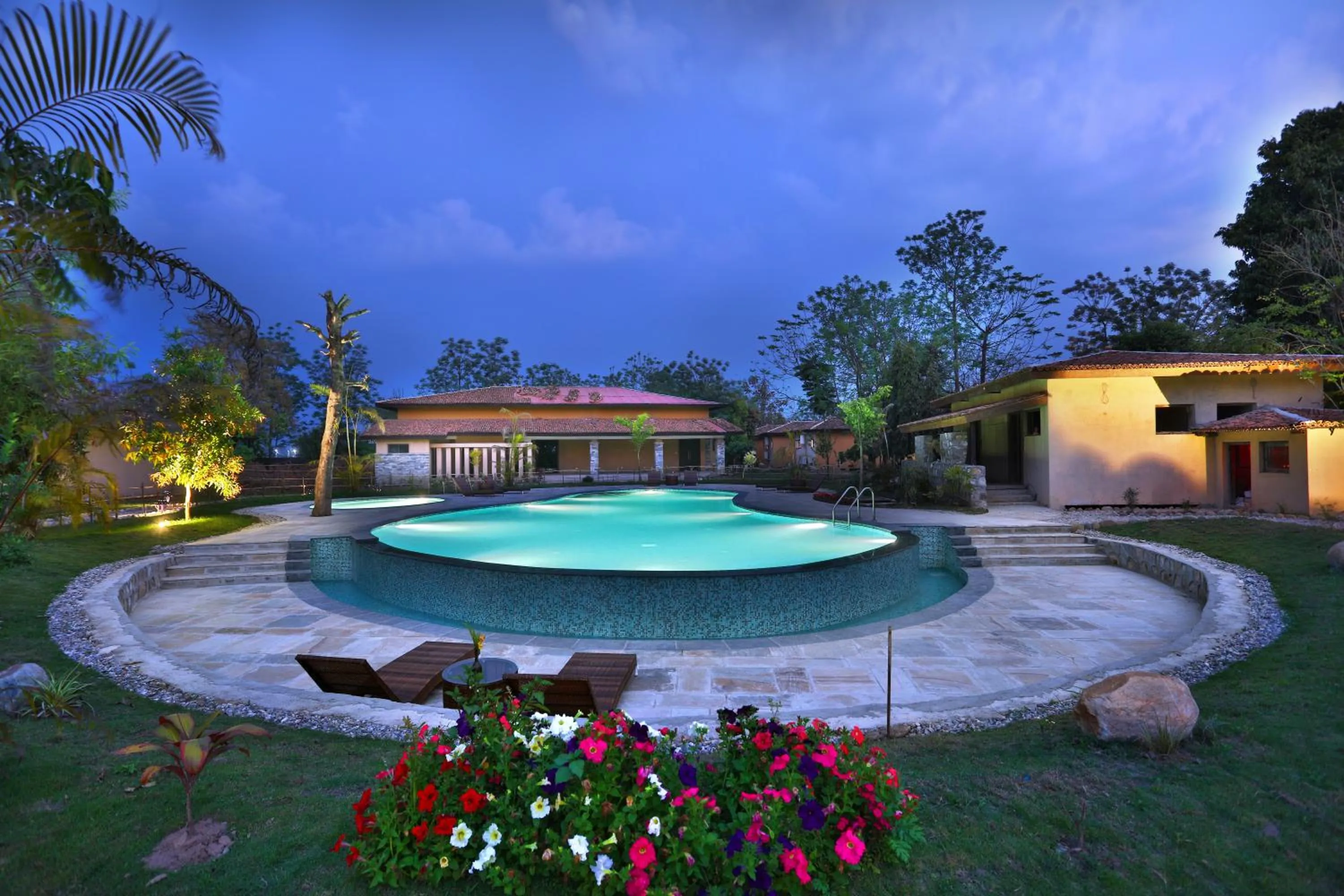 Swimming pool in Jungle Villa Resort - Near Chitwan National Park