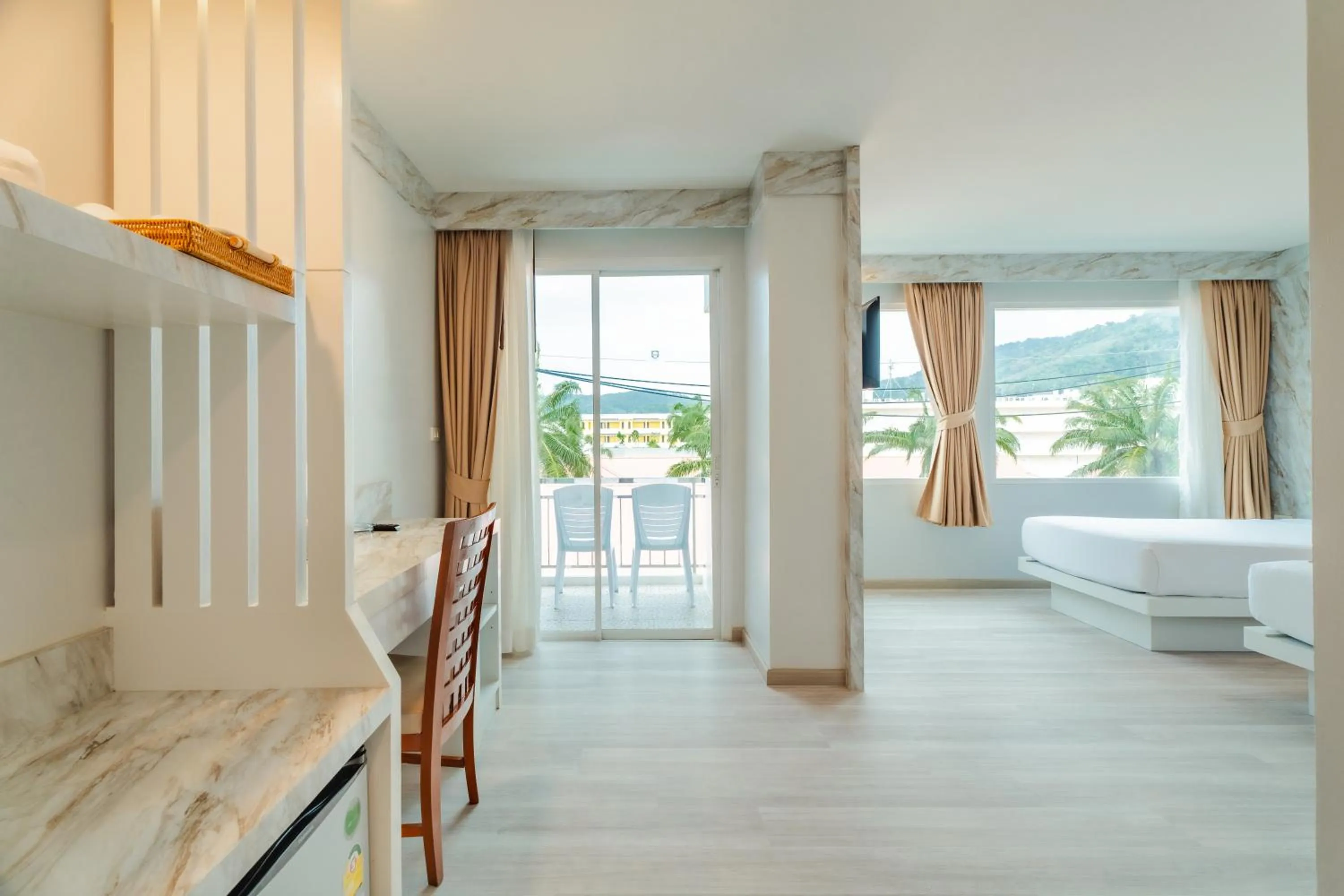 Photo of the whole room, Bed in Baumancasa Beach Resort