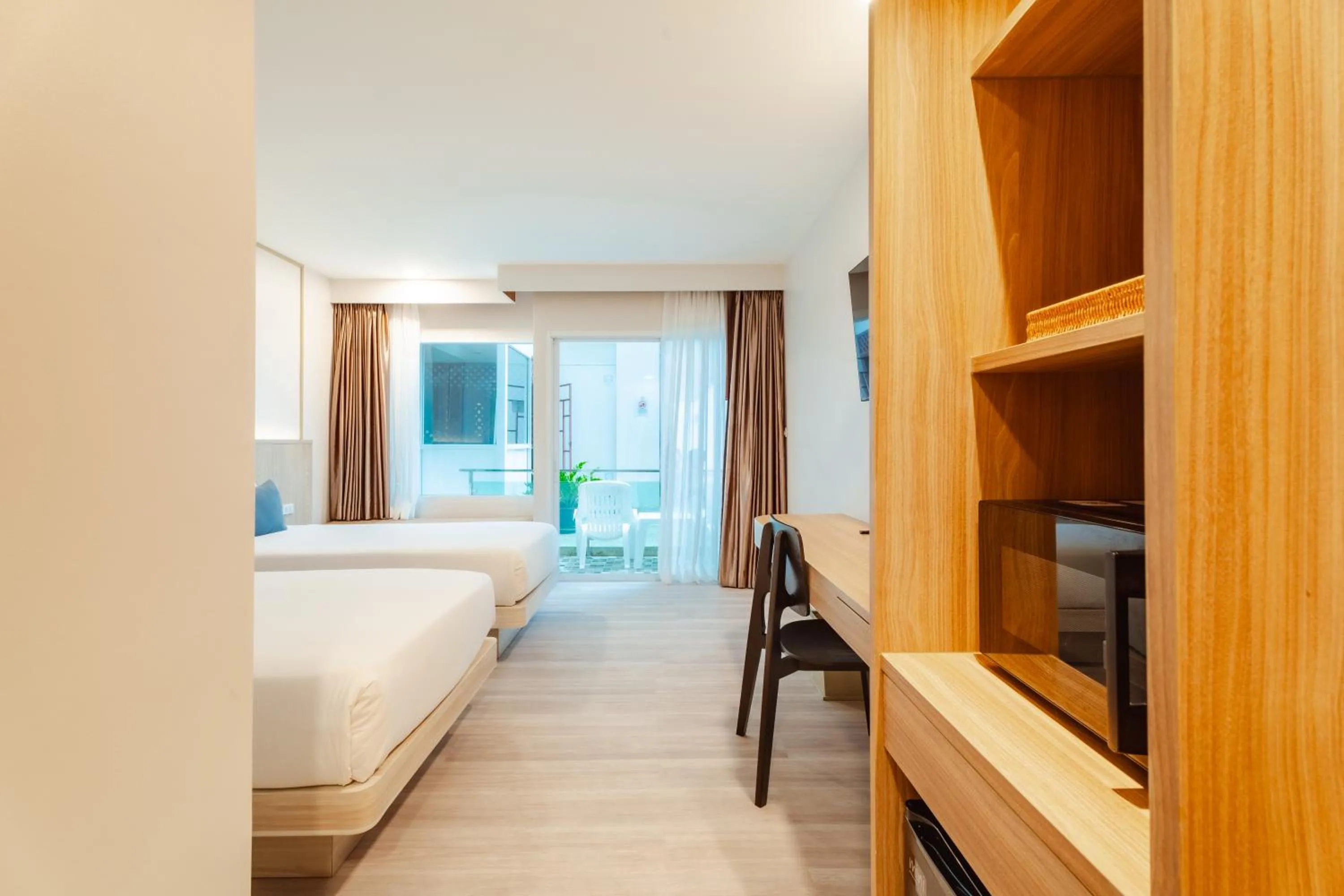 Photo of the whole room, Bed in Baumancasa Beach Resort