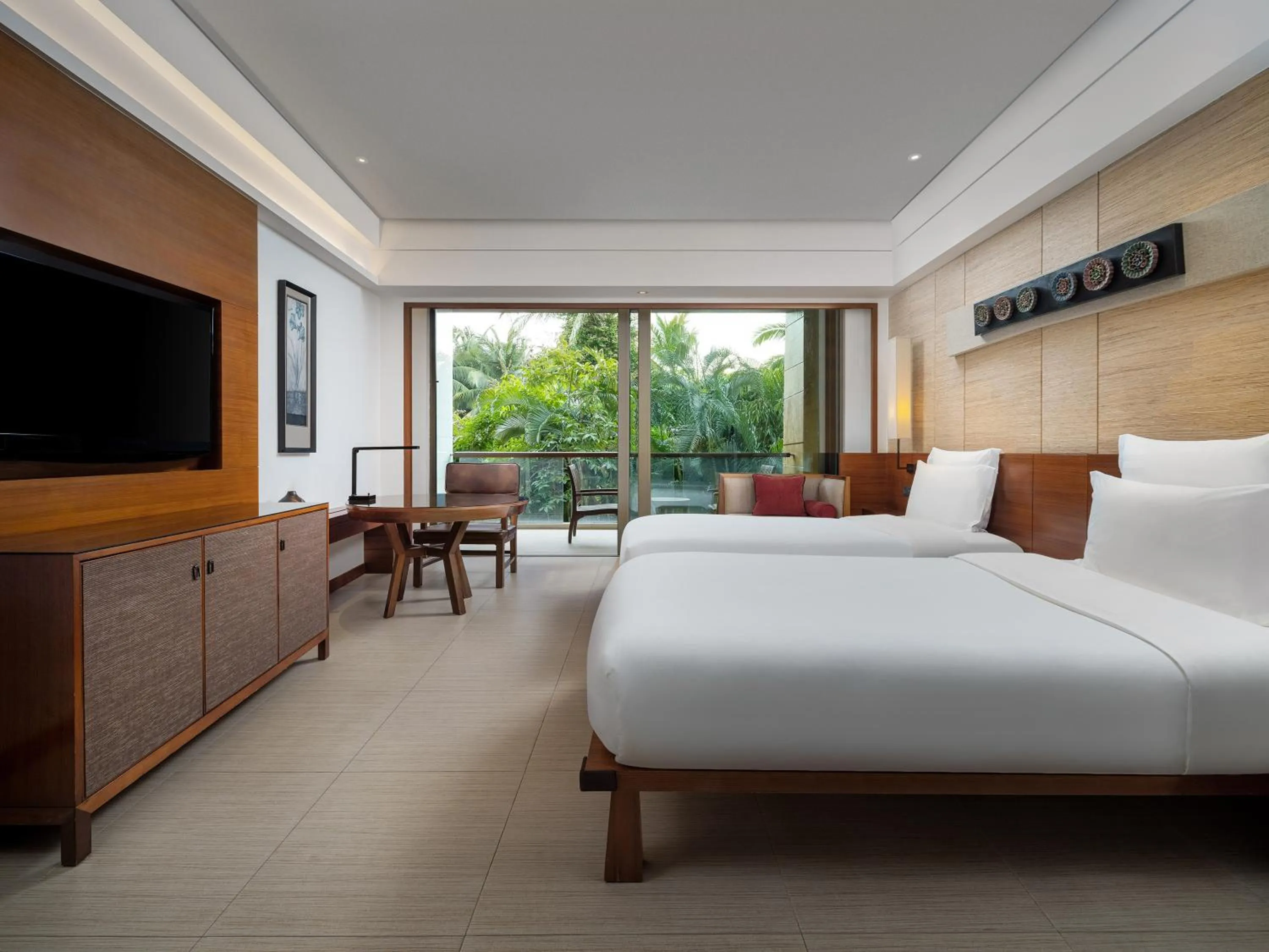 Property building, Bed in Pullman Oceanview Sanya Bay Resort & Spa