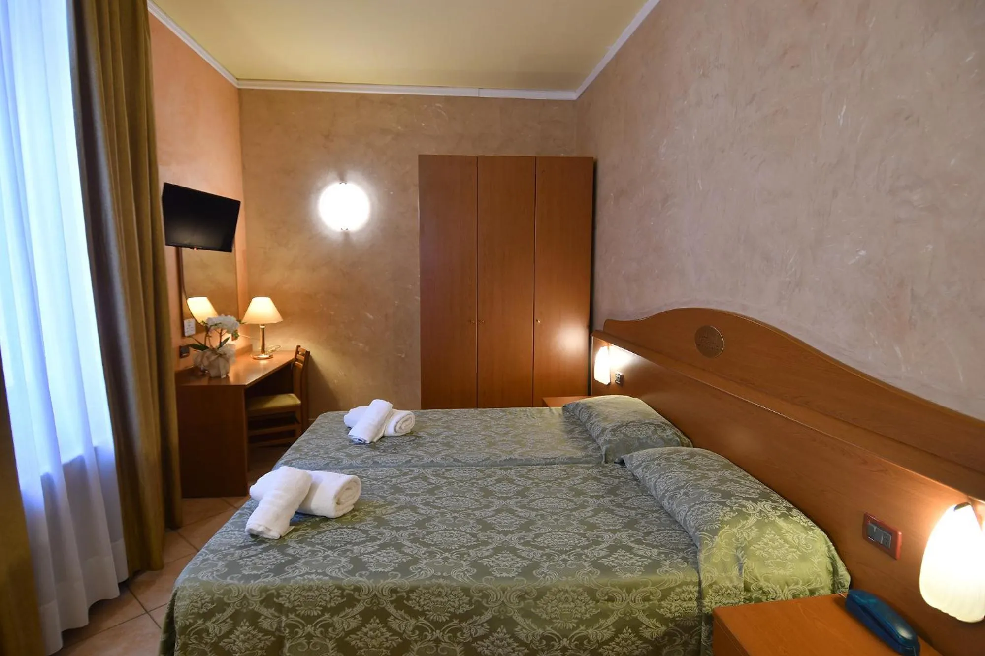 Bed in Hotel Innocenti