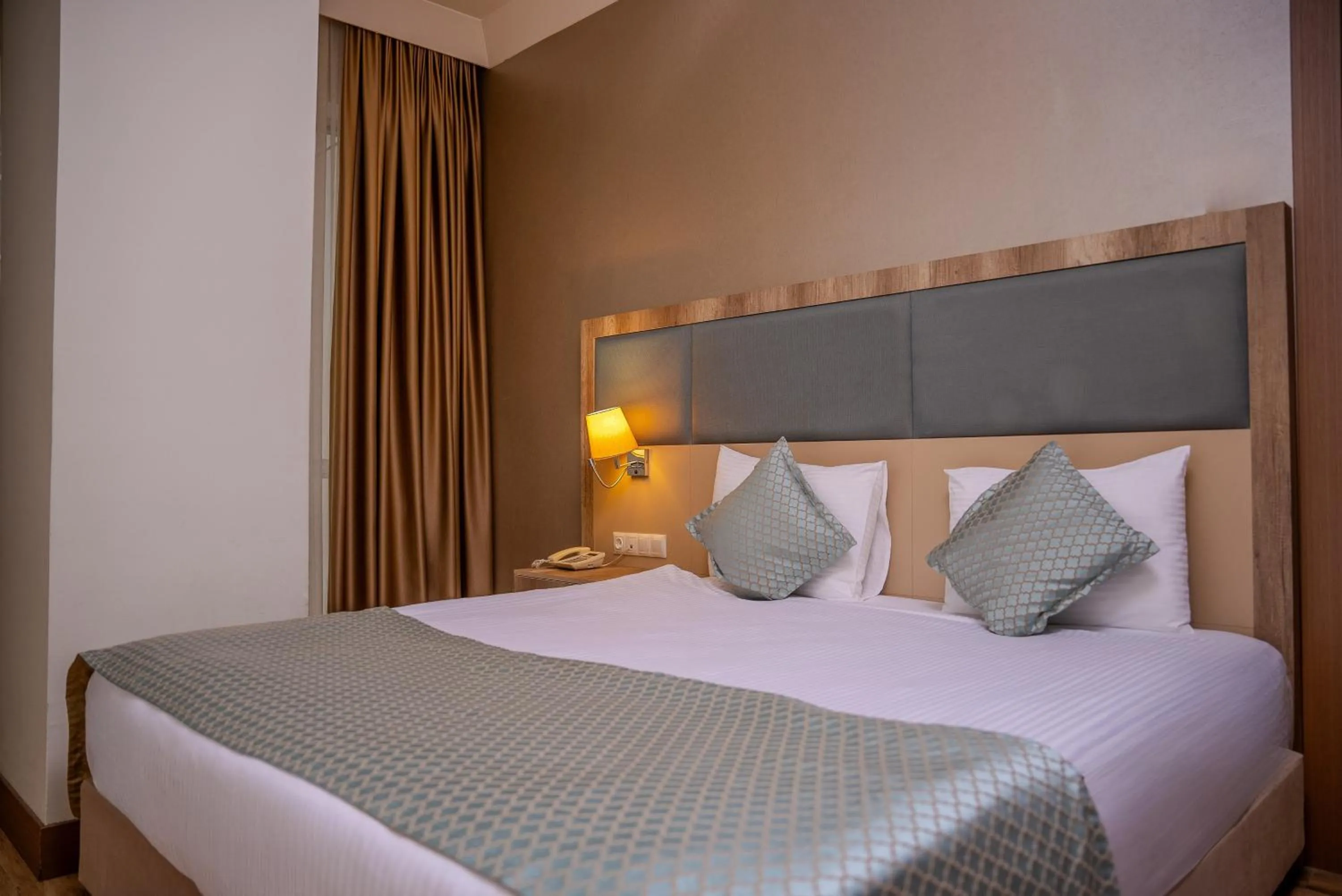 Bedroom, Bed in Mari Suites Hotel