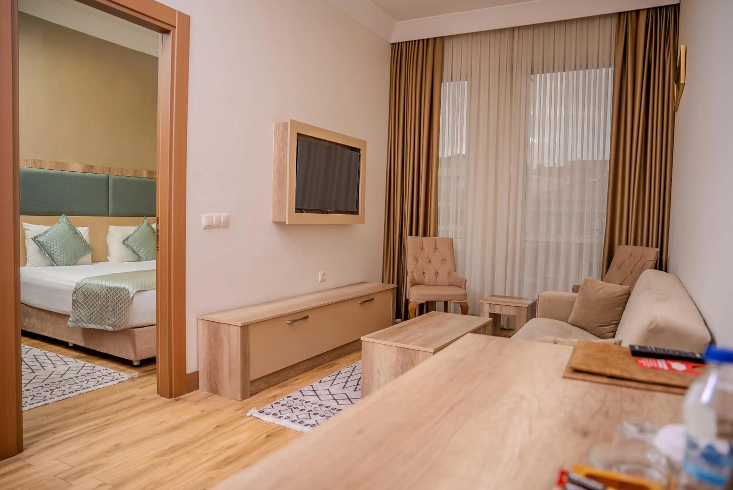 Bed in Mari Suites Hotel