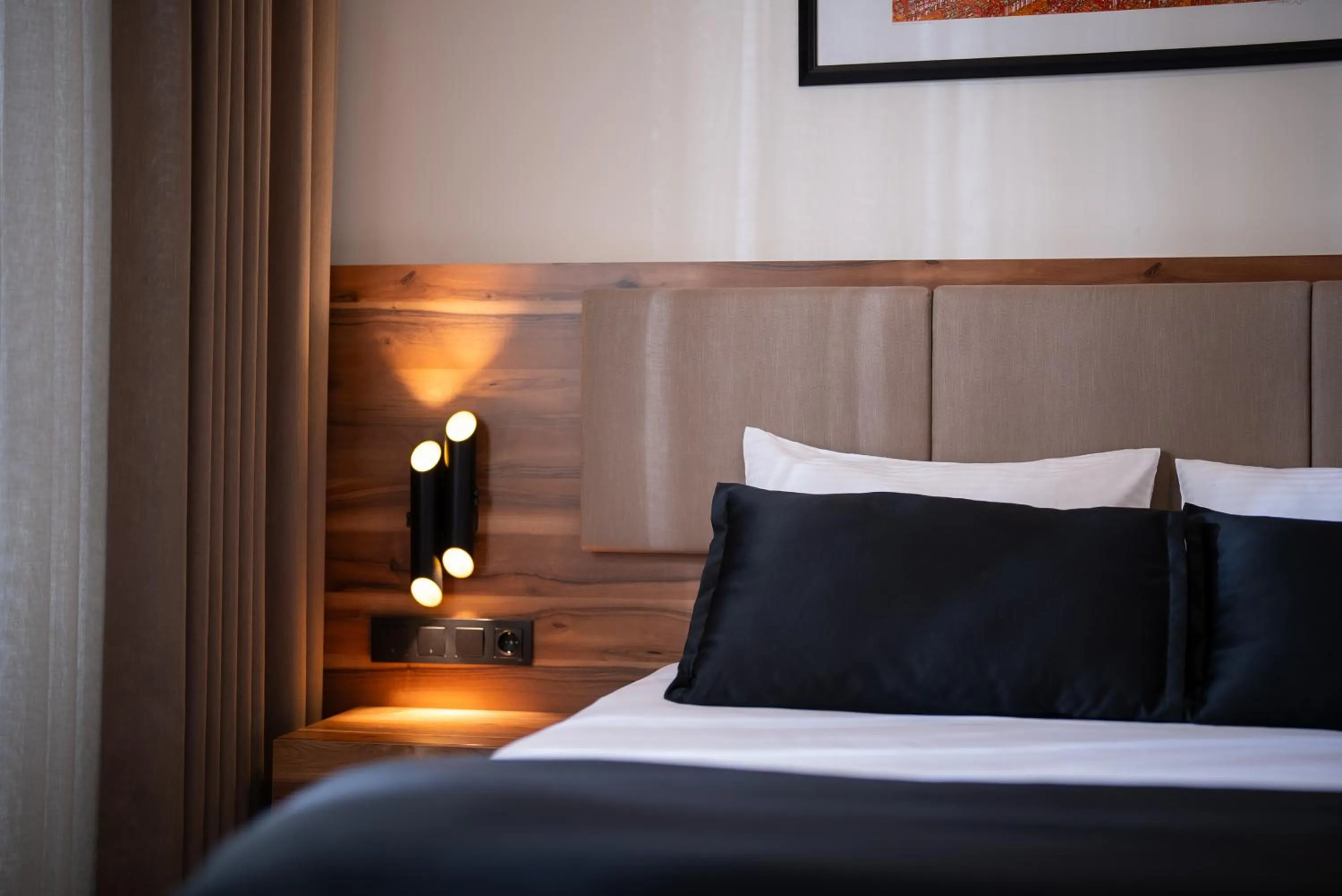 Bed in Mari Suites Hotel