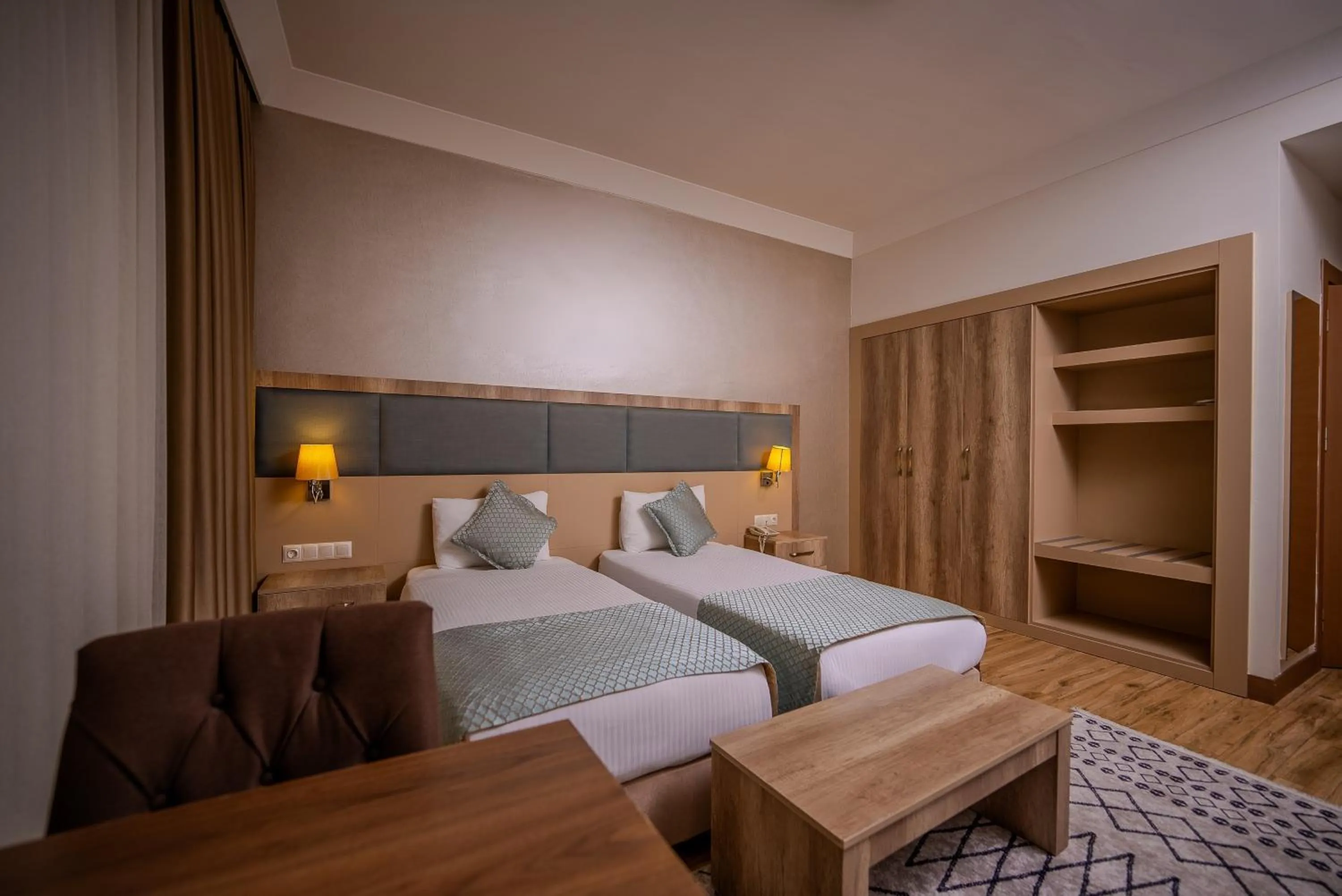 Bed in Mari Suites Hotel