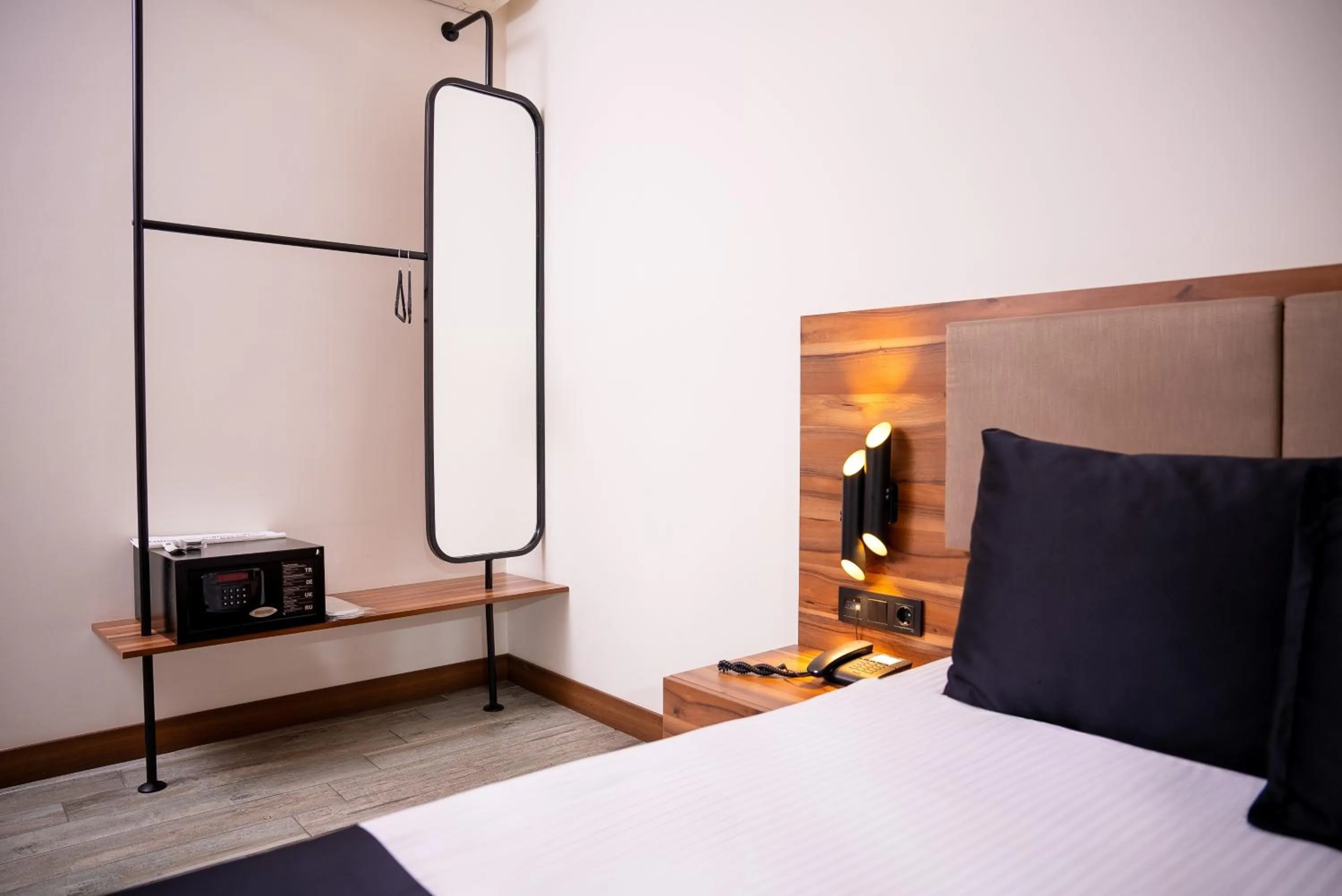 Bed in Mari Suites Hotel