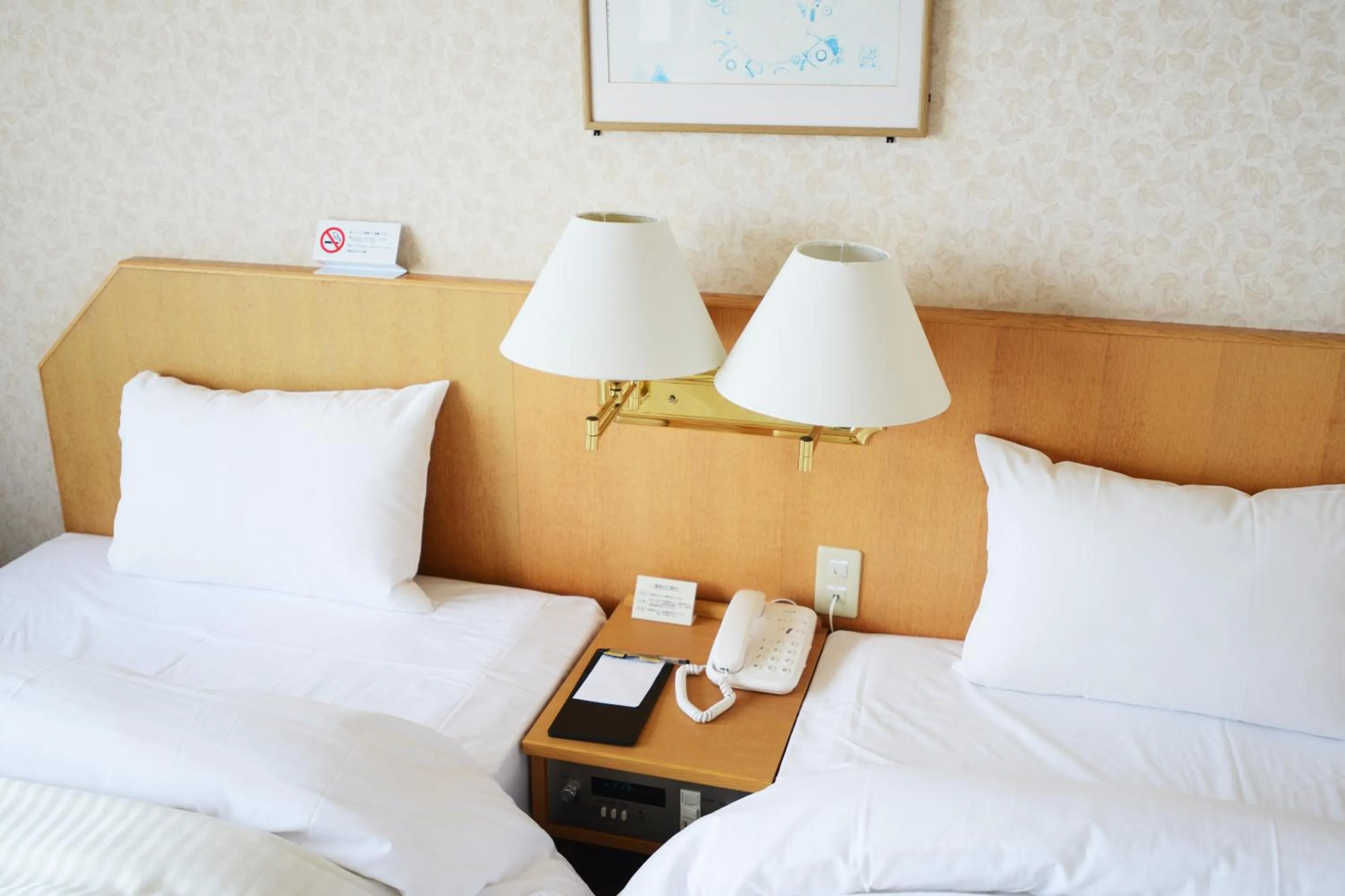 Bed in Tsushima Grand Hotel