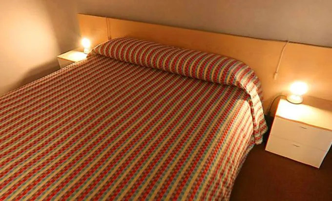 Bed in Hotel Residence Universo