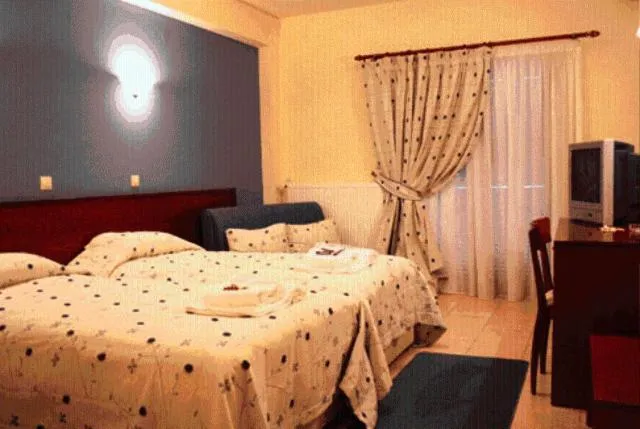 Bed in Asteras Hotel