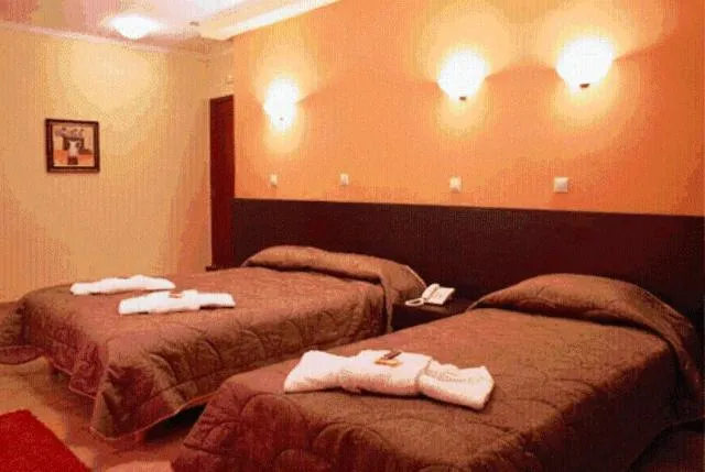 Bed in Asteras Hotel