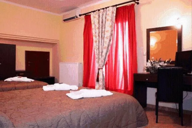 Bed in Asteras Hotel