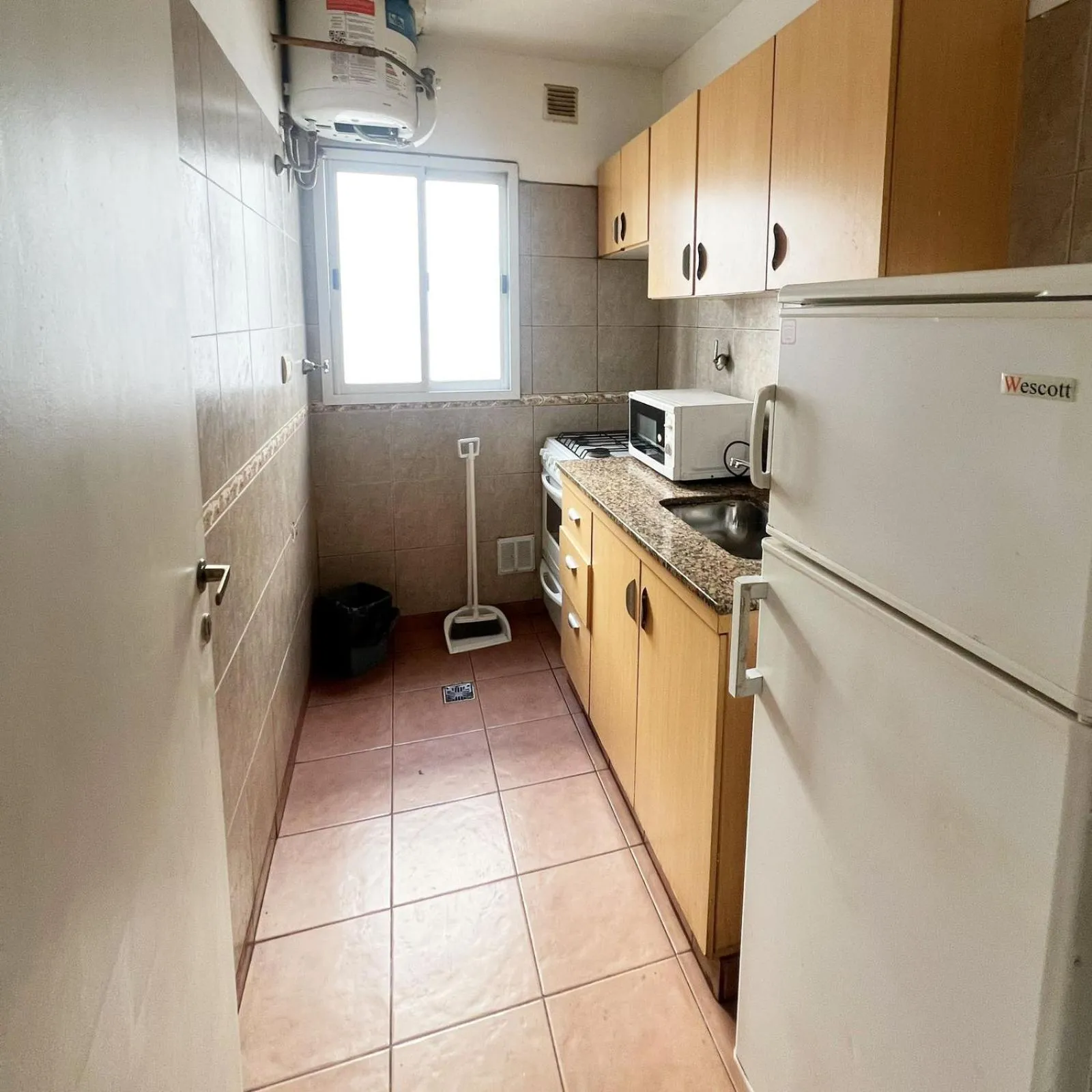 Kitchen or kitchenette in Miliño Apart Hotel