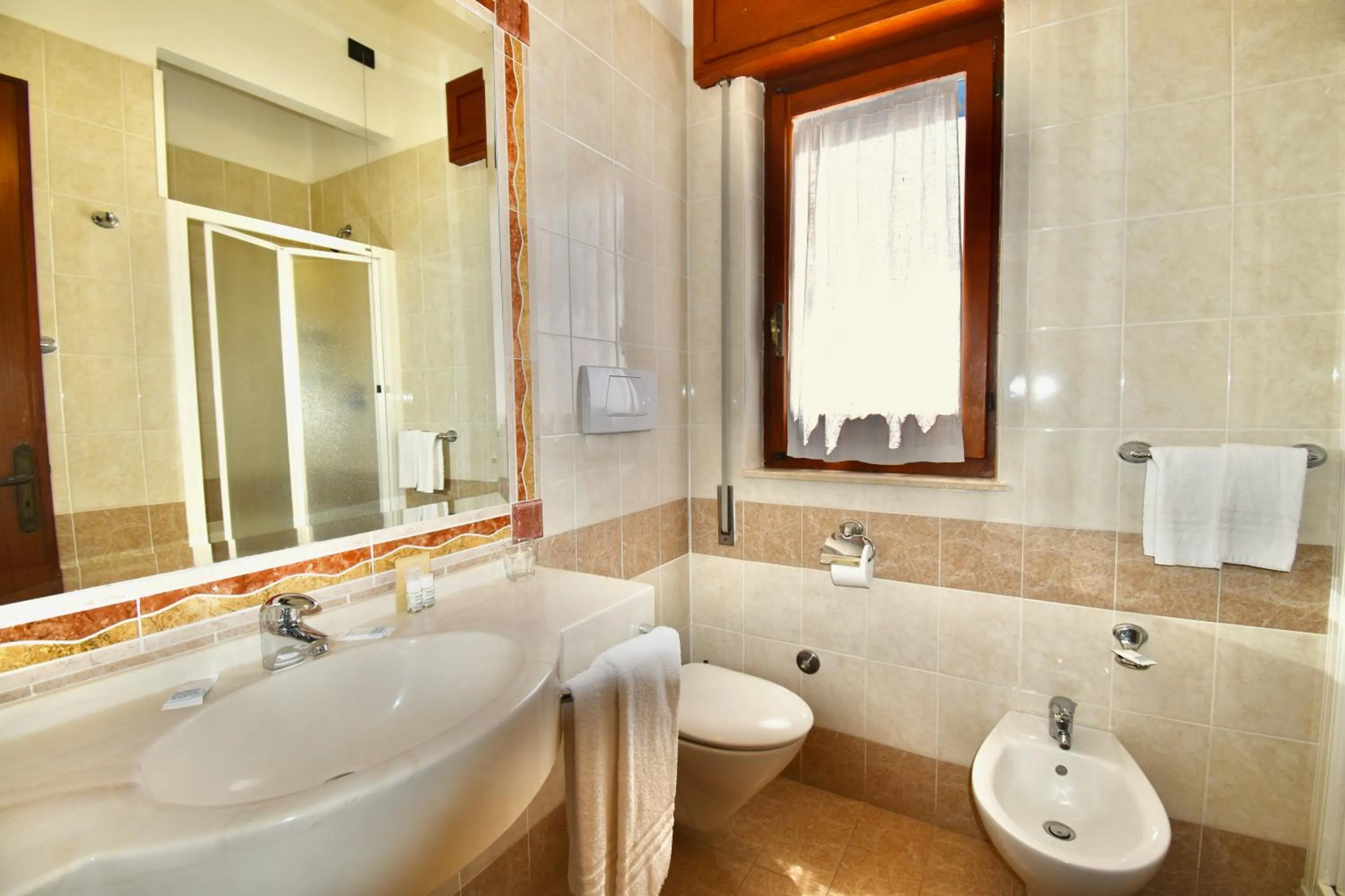 Bathroom in Cossyra Hotel