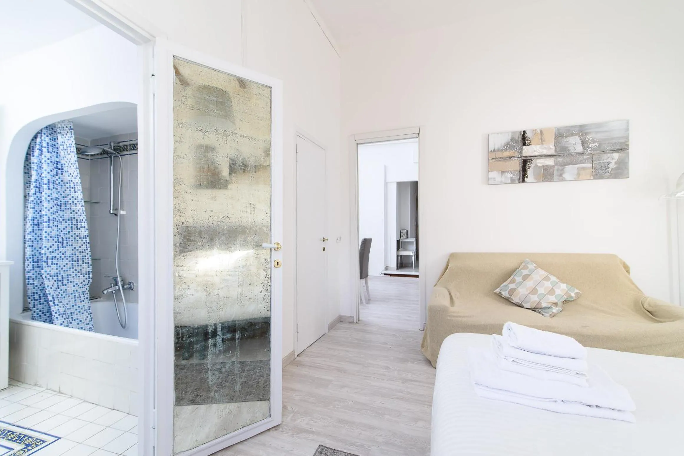 Bed in White terrace apartment navona