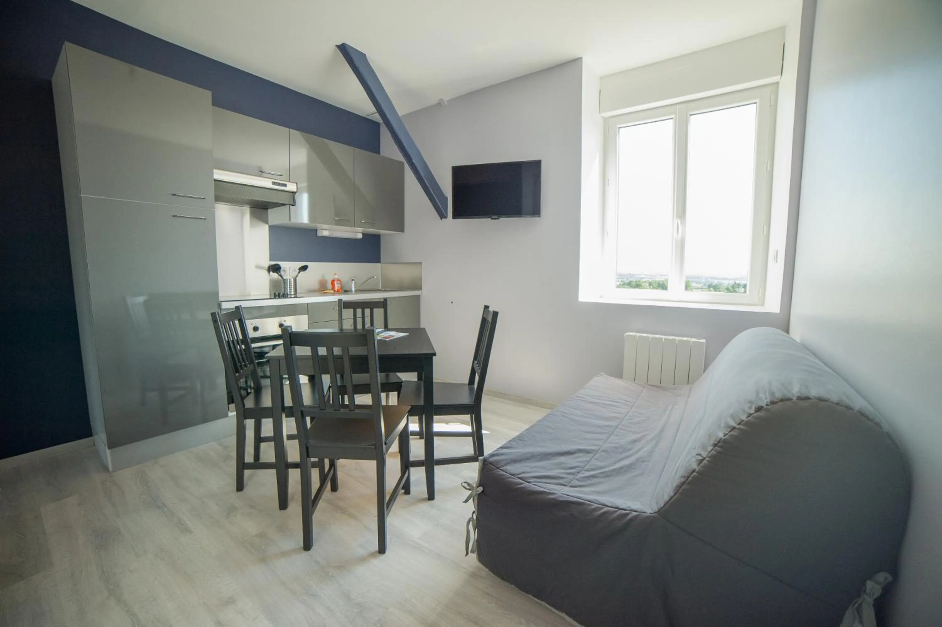 Living room in Appart Hotel de la Souleuvre