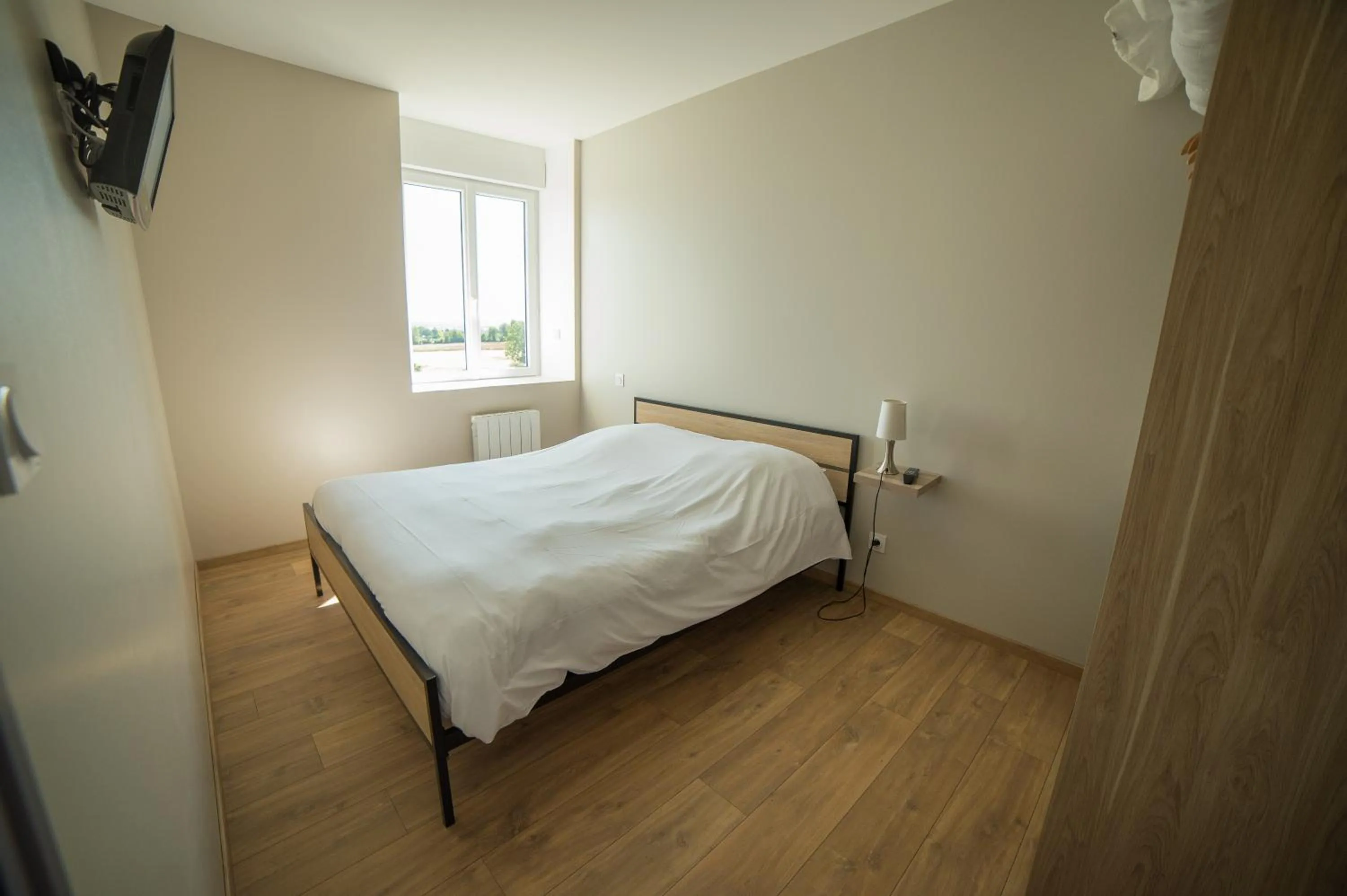 Bed in Appart Hotel de la Souleuvre