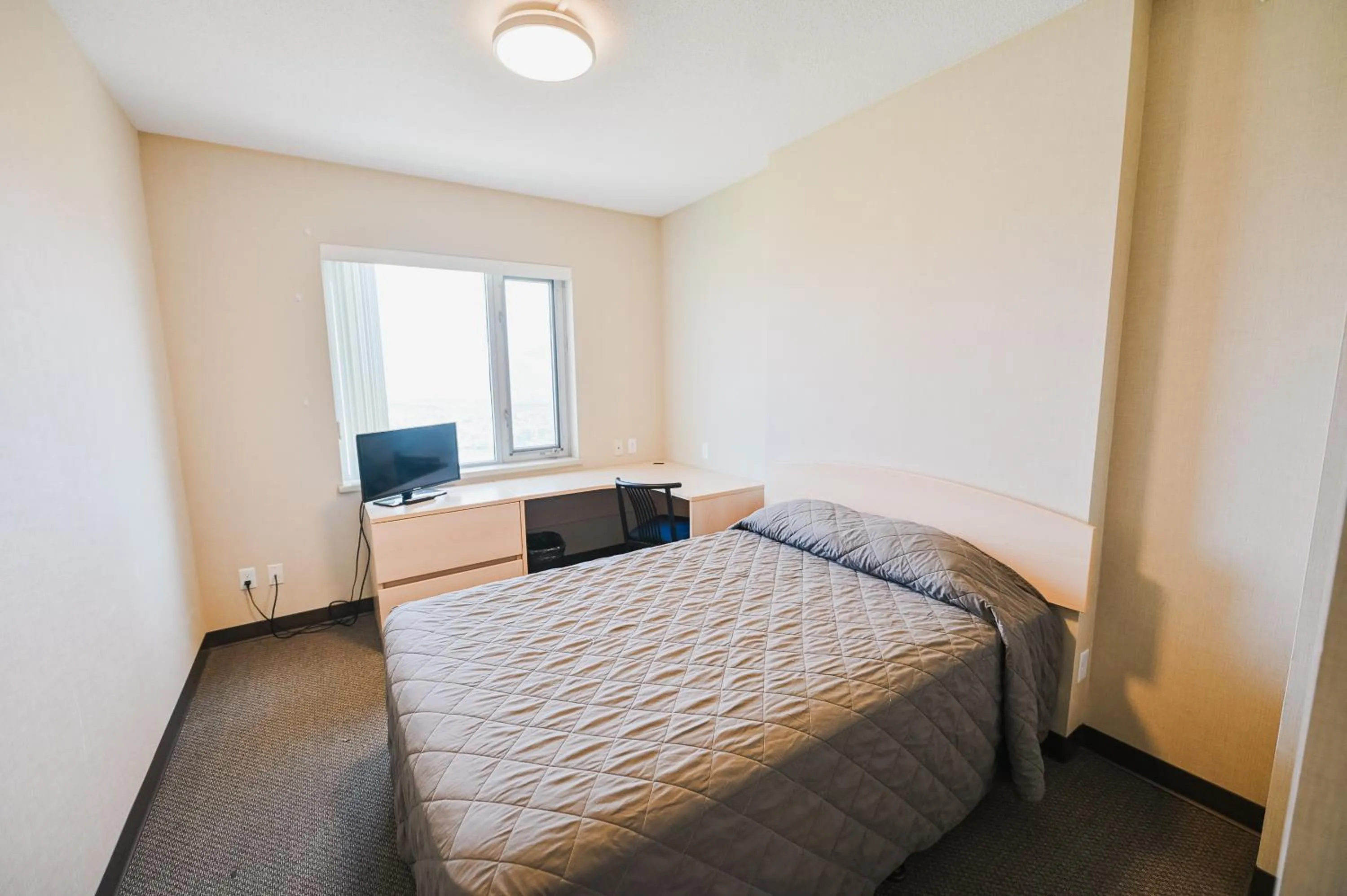 Bedroom, Bed in Residence & Conference Centre - Kamloops