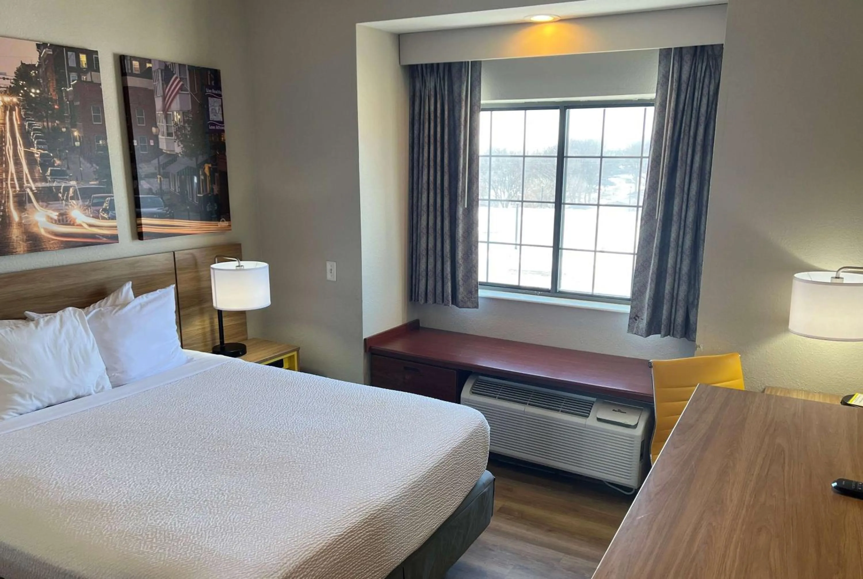 Photo of the whole room, Bed in Days Inn by Wyndham near Kansas Speedway